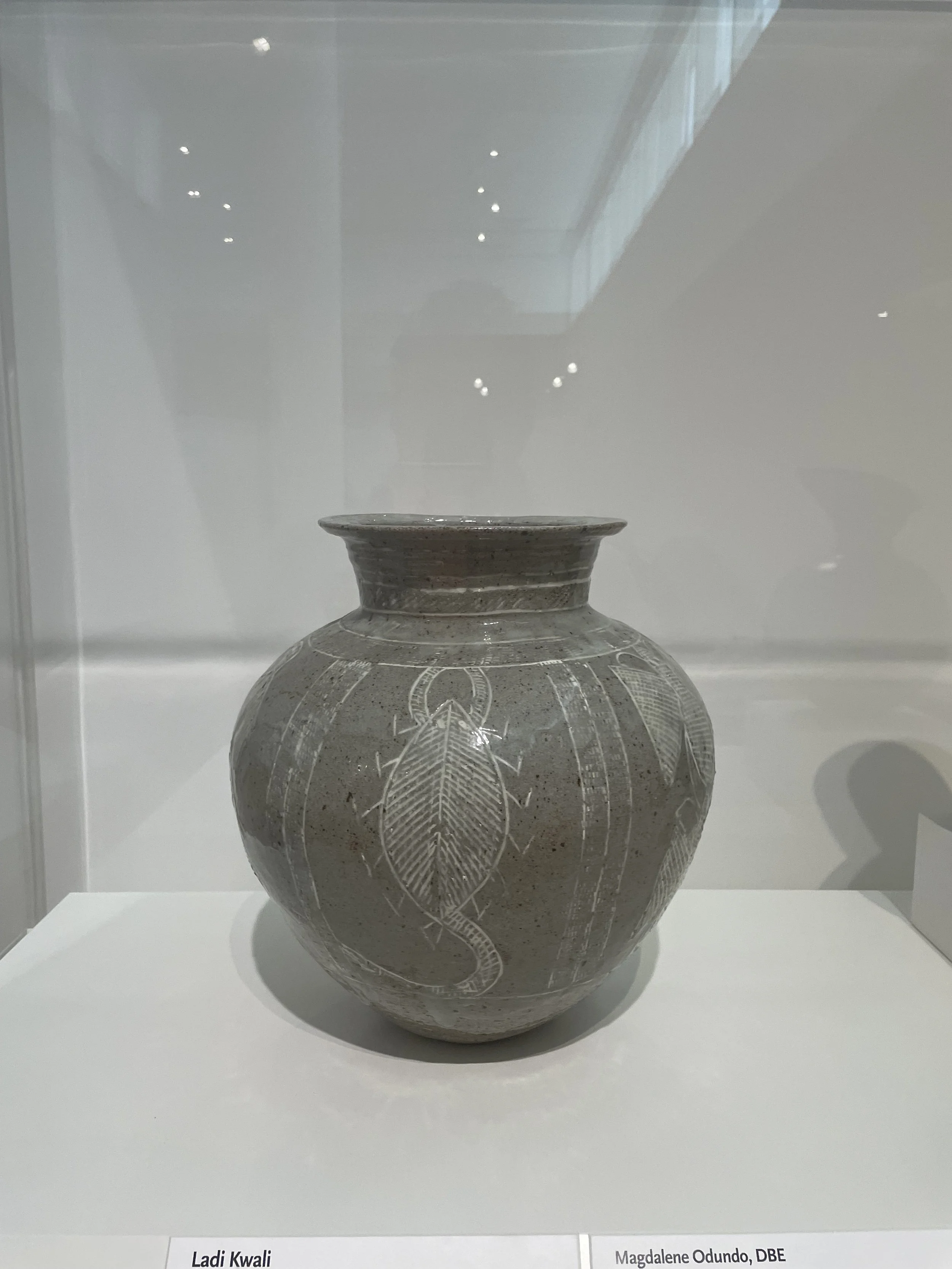 Ladi Kwali, Green Water Jar, 1972. Stoneware with incised zoomorphic designs.