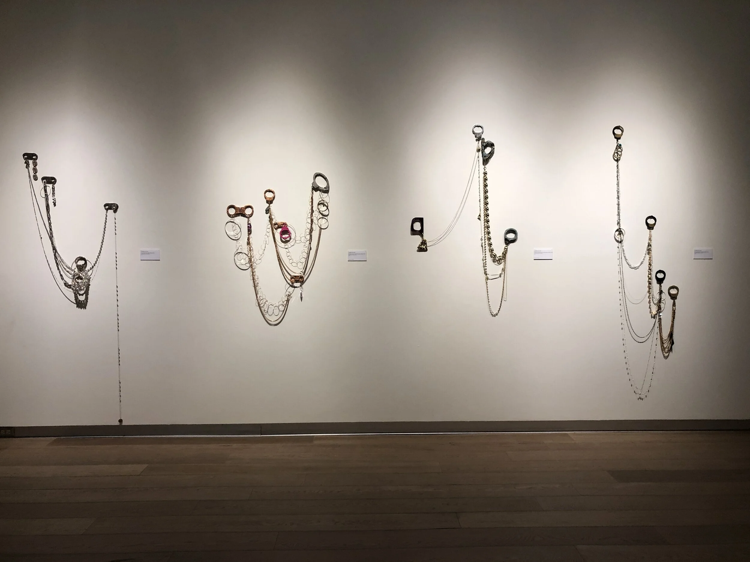 Kambui Olujimi, Killing Time series, 2017 (handcuffs and costume jewelry)