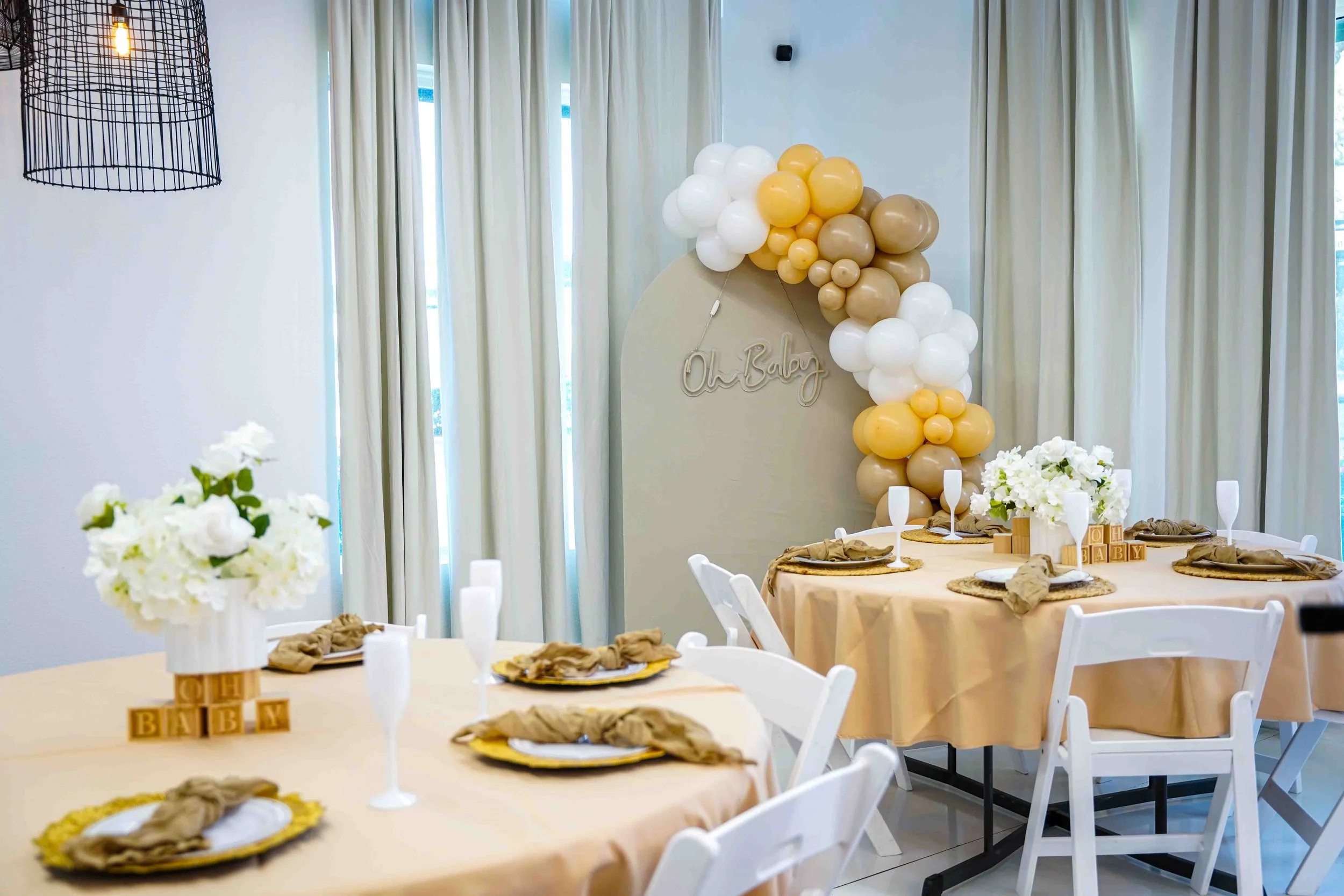 Intimate event venue in North Dallas with table setup for small gatherings and celebrations near Farmers Branch and Plano. This image showcases our modern event venue located in North Dallas, available for rent for intimate gatherings and celebration