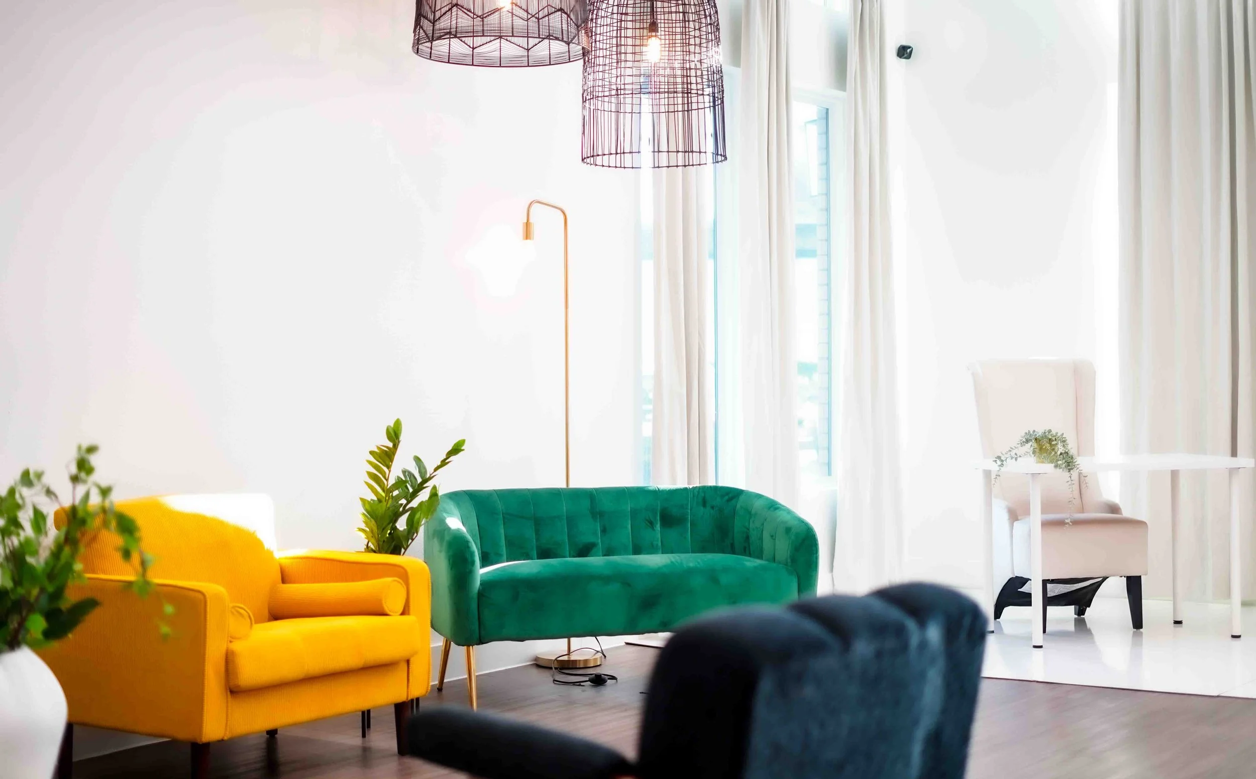 Upgraded portrait studio Dallas featuring black and gold luxury photoshoot set