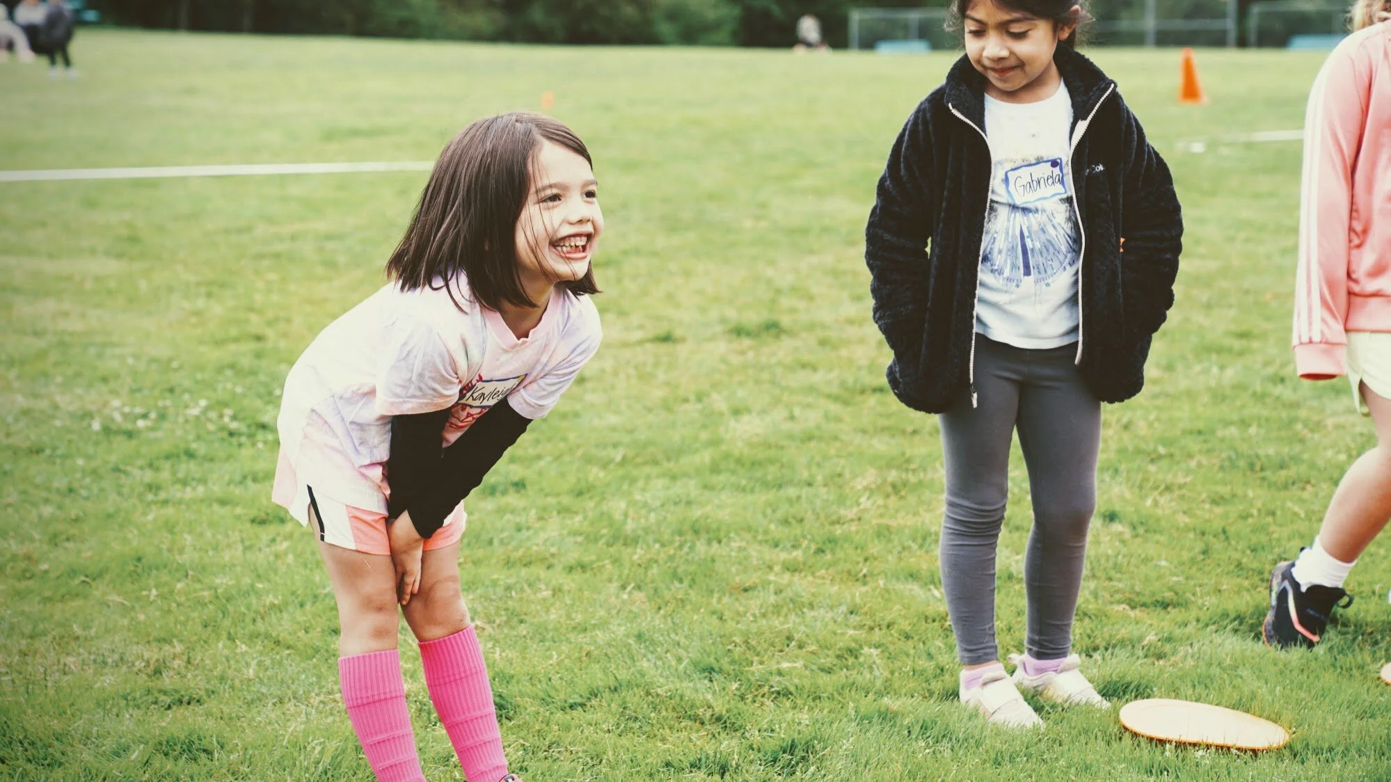 Girls learning football skills at Girls Sports Club clinic
