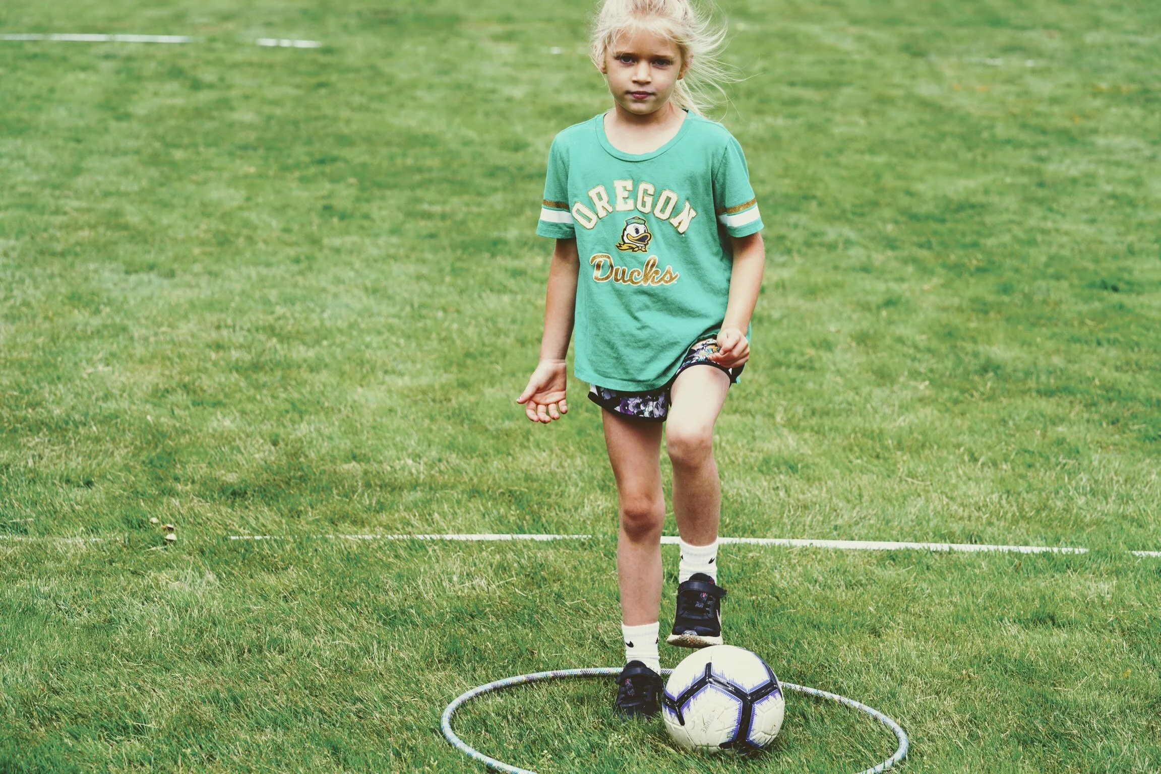 Girls learning soccer skills at Girls Sports Club clinic