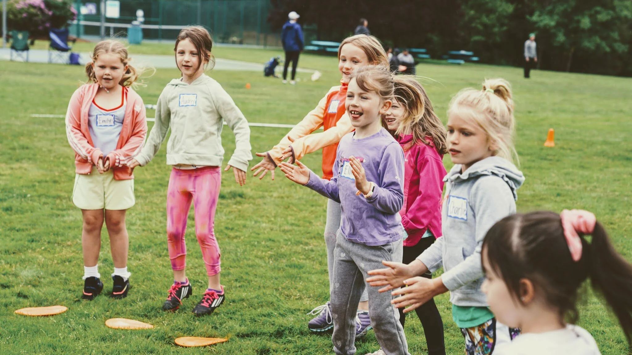 Girls learning football skills at Girls Sports Club clinic