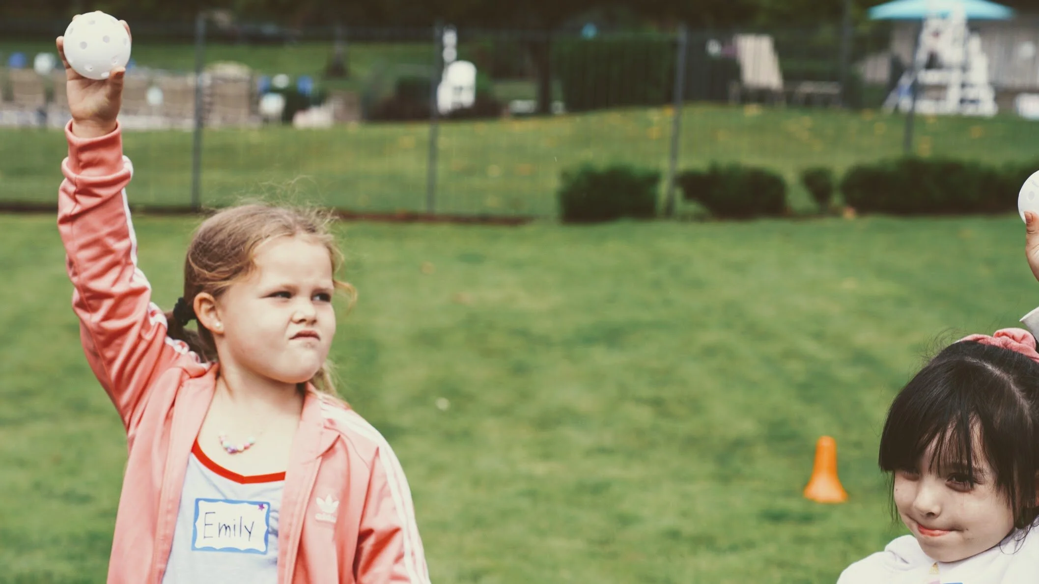 Girls learning throwing skills at Girls Sports Club clinic