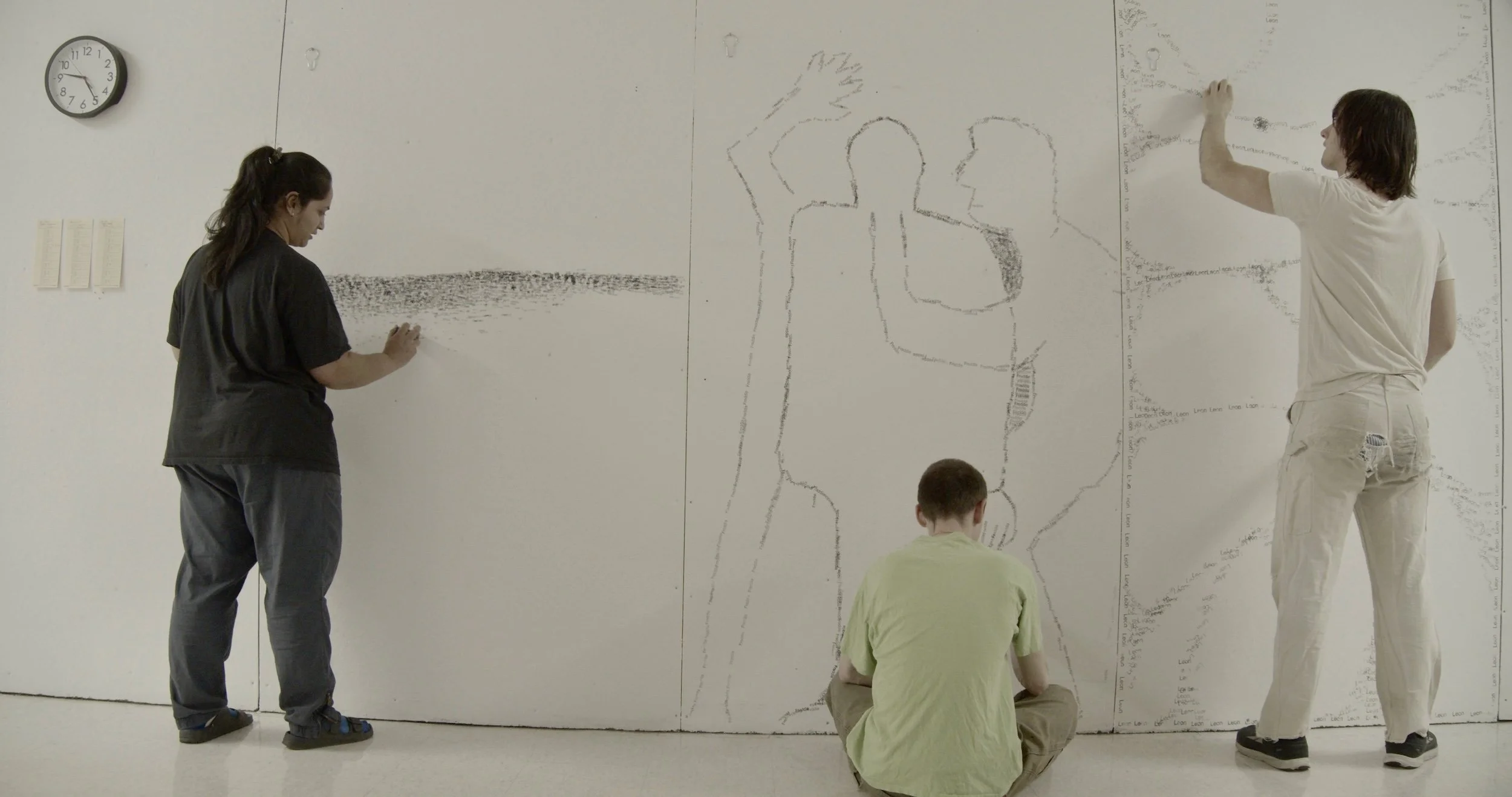 Untitled performance in Kennedy hallway, 2026, Performance on existing drywall, 

conceived by Shailee Thakkar, performed in collaboration with Freddie Famglietti and Leon Grossman