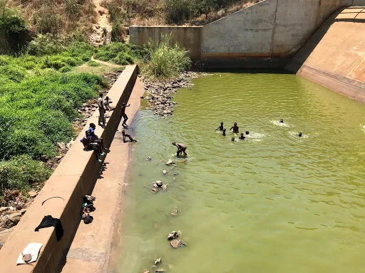 Children swimming (missing school)
