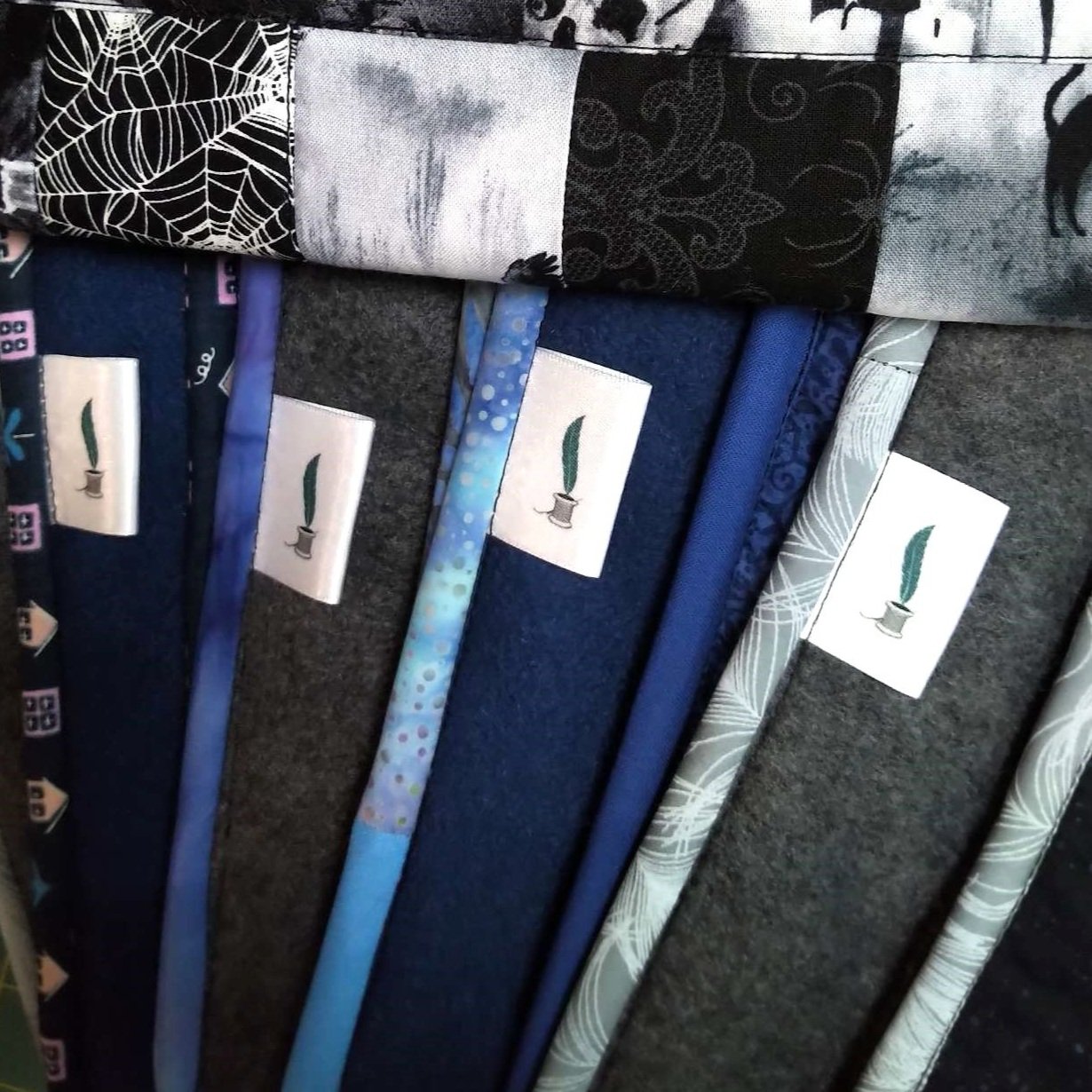 a collection of travel quilts showing the back too