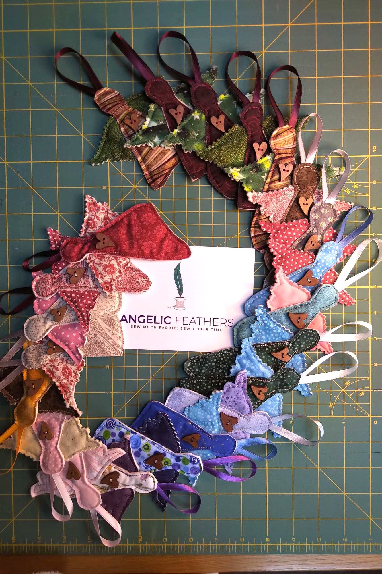 A collection of Celestial Hanging Angels in a rainbow of colours