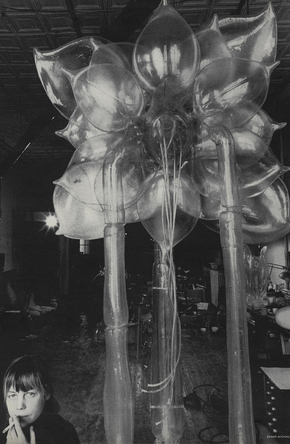 Lee Bontecou and one of her sculptures. Photo by Duane Michals for Vogue, May 1969.