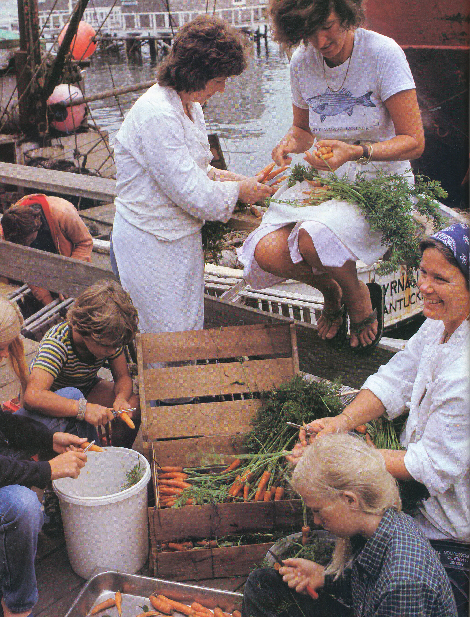 Peeling carrots outside the Straight Wharf restaurant. From 'The Victory Garden Cookbook', 1982.