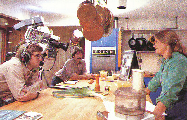 Filming the vegetable recipe segment of 'The Victory Garden' in her own kitchen. From 'The Victory Garden Cookbook', 1982.