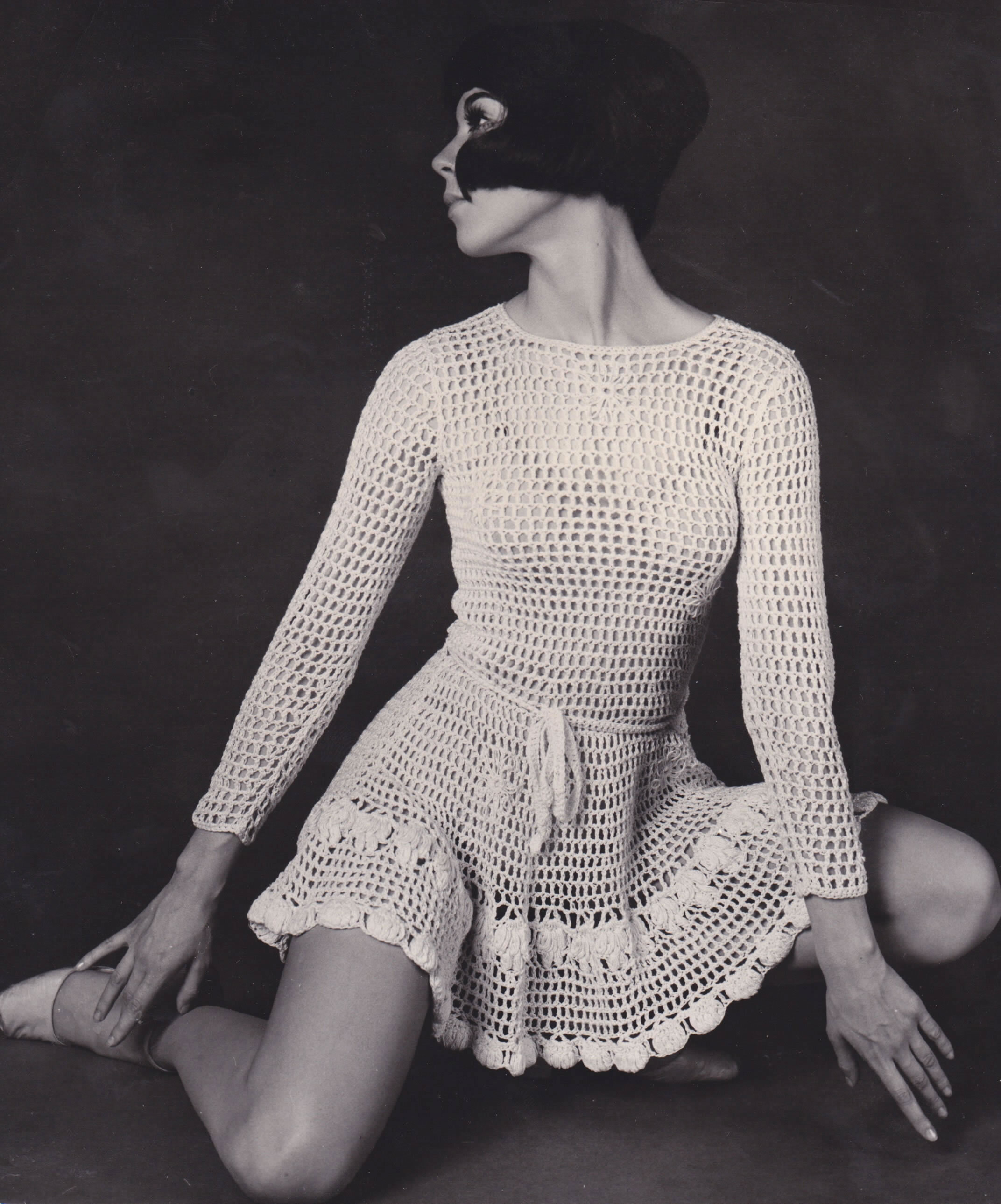 The see through Mini Dress, made of lace or crochet, that Vicky Tiel made to wear while working at the Cafe Wha and which she began selling while still in school.