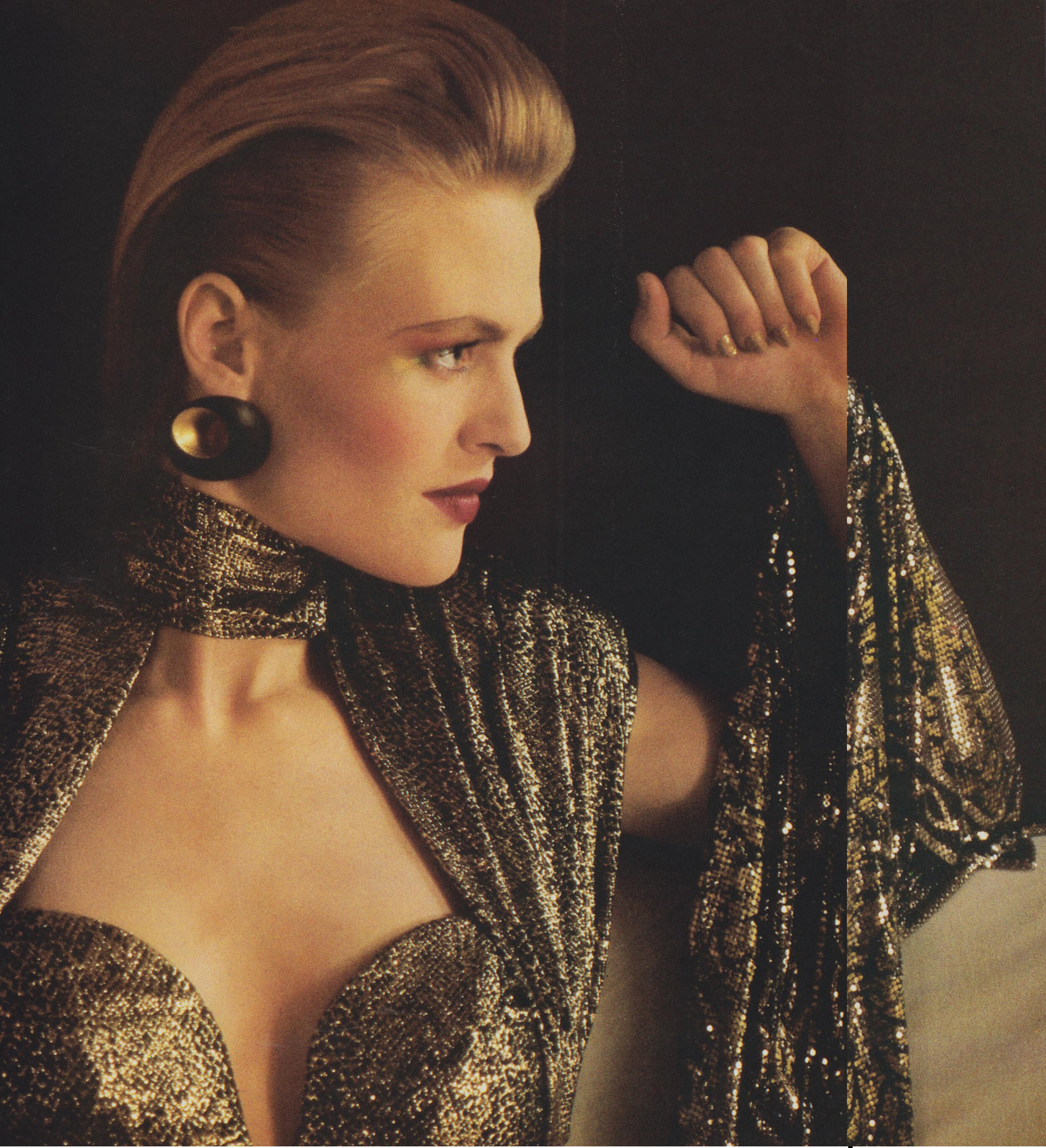 Serpent-print gold lamé photographed by Sheila Metzner for Vogue, September 1985.
