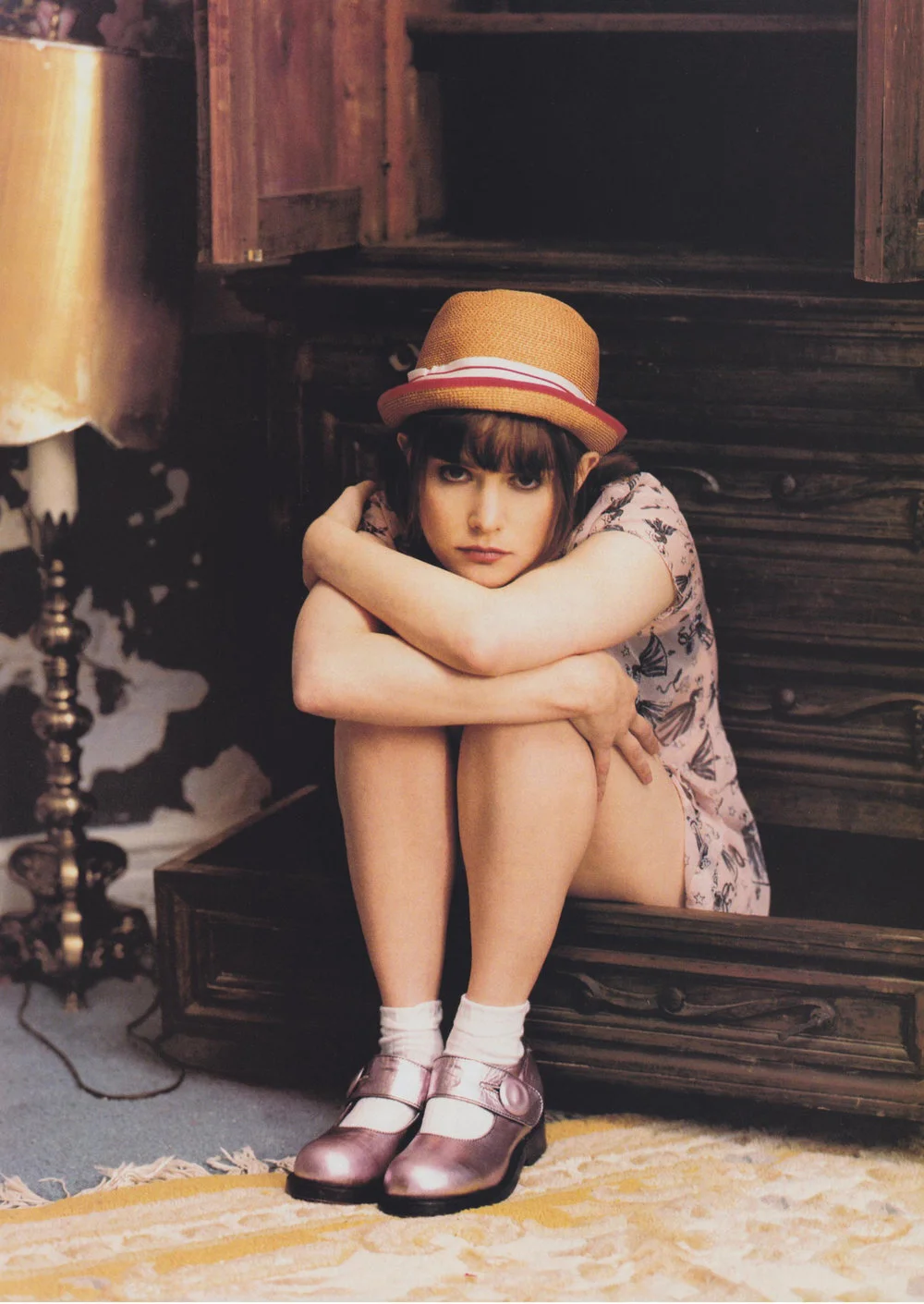 Jennifer Jason Leigh in an Anna Sui dress and mary-janes. Photographed by Steven Meisel, February 1994.