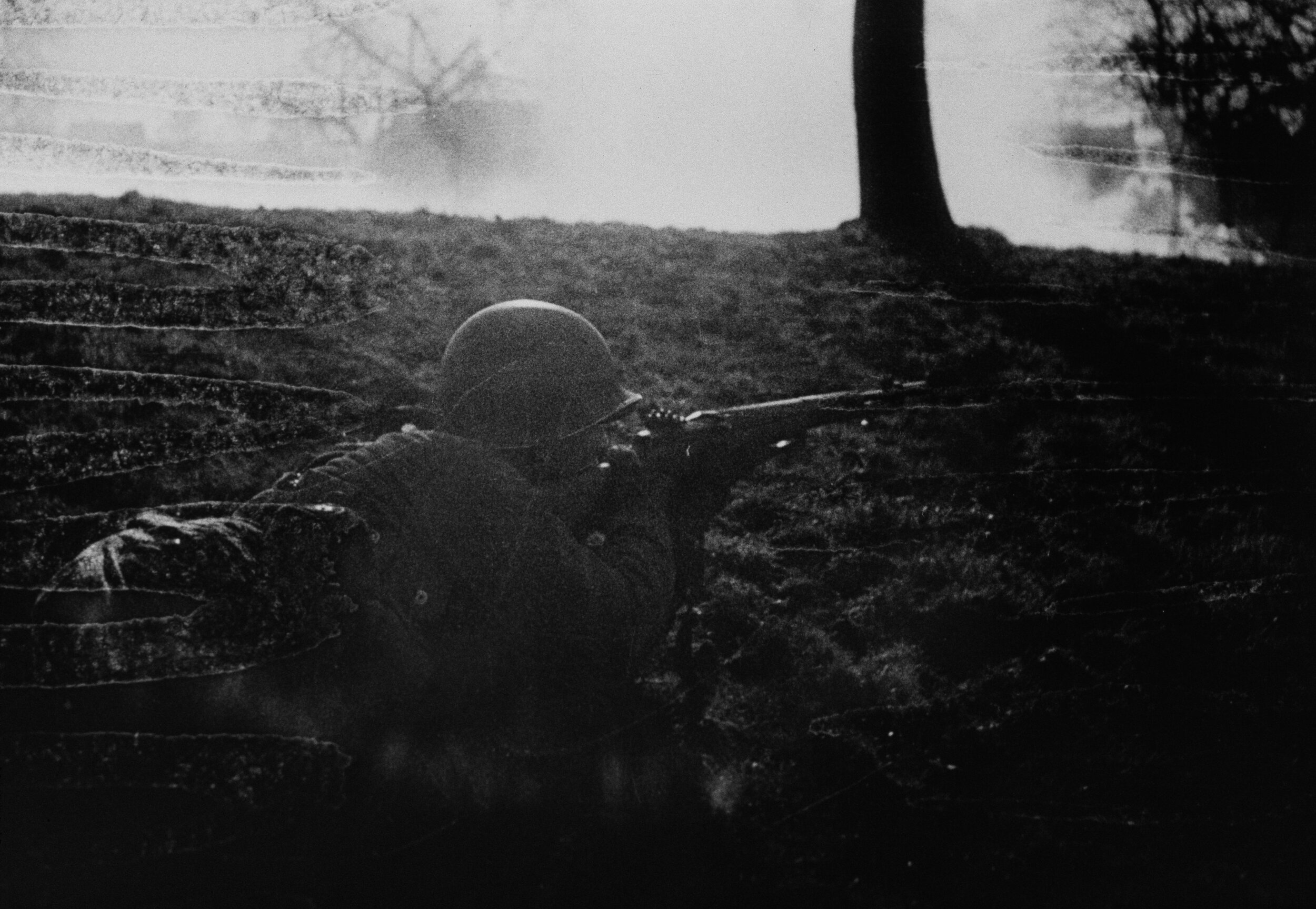 vaccaro_aim to kill_An American GI lines up a shot during the battle on the Rhineland Valley, March, 1945. .jpg