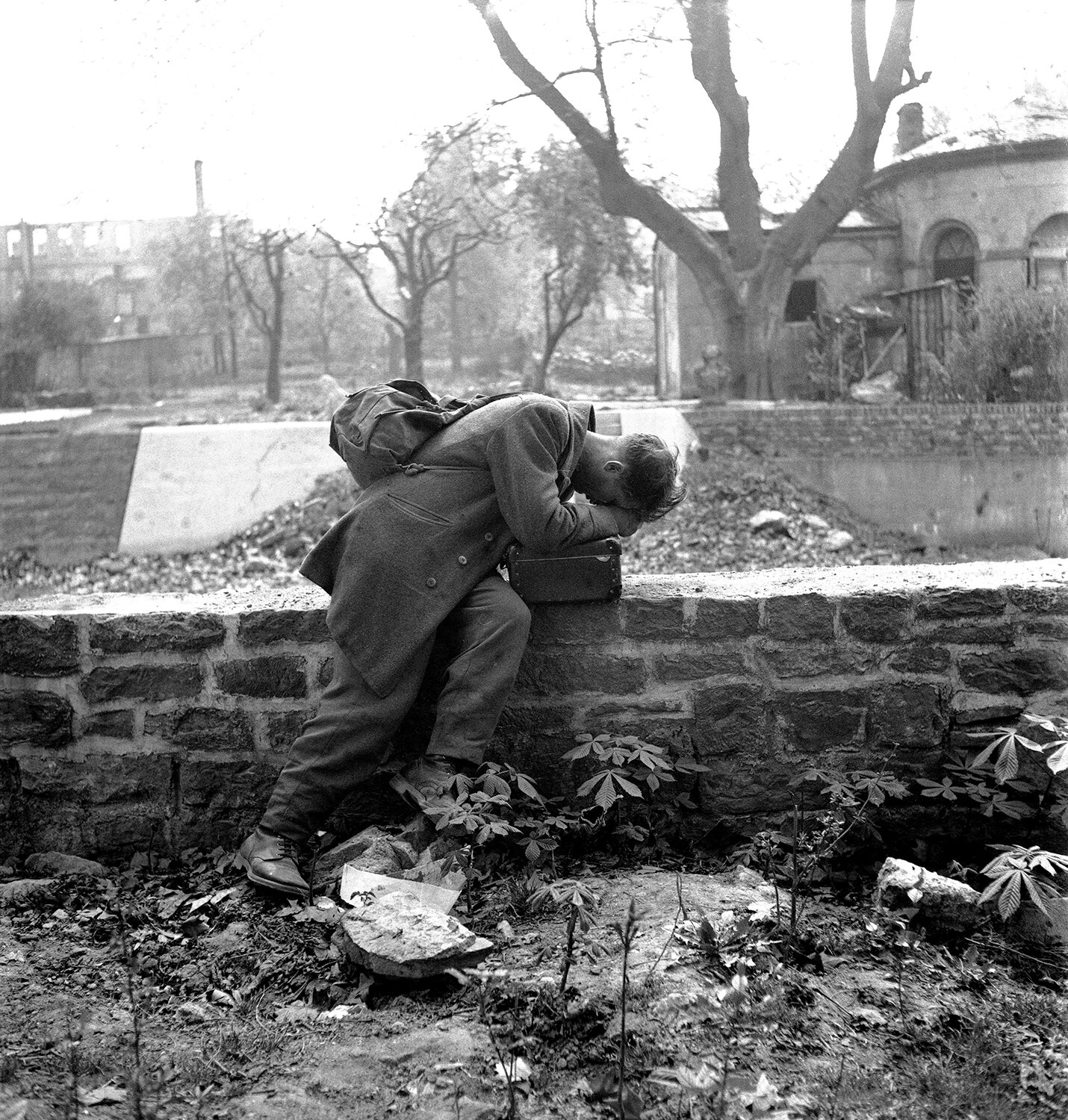 vaccaro_defeated soldier_A German soldier, held prisoner in the United States of America, returns to his Frankfurt home only to find rubble. March 4, 1947.jpg