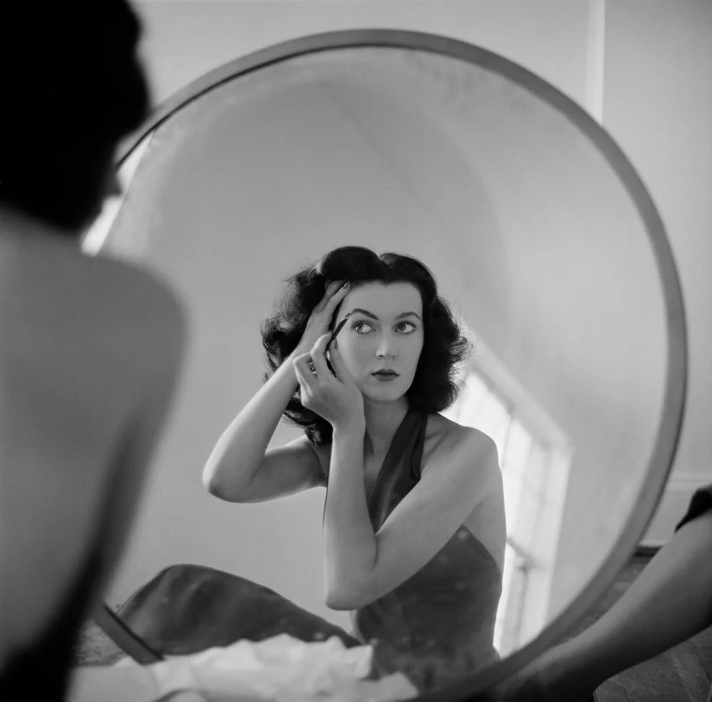 Dovima prepares for a shoot, NYC, 1953