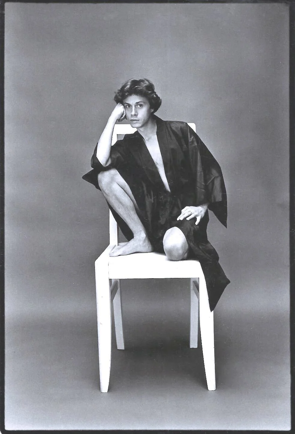 "While I sit here in a beautiful silk bathrobe givin to me by the photographer Alice Springs for this portrait."