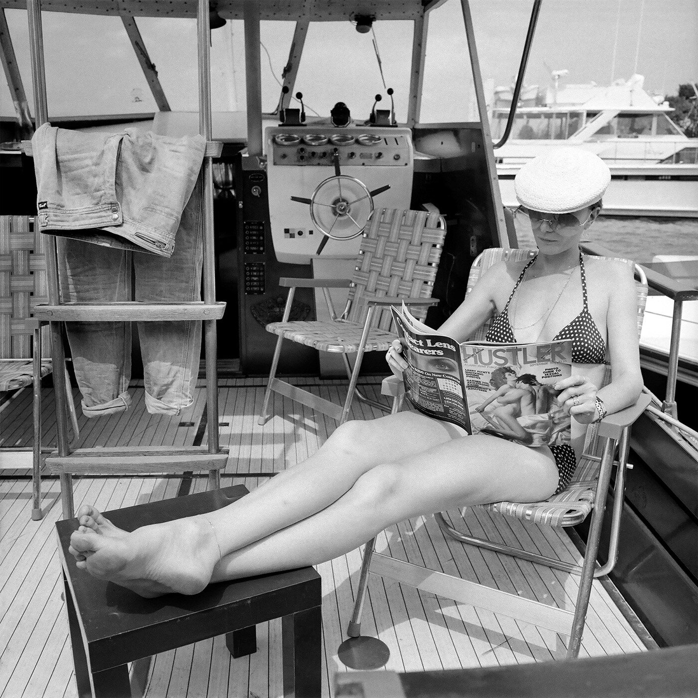Hustler on a boat, Fire Island Pines, NY, 1978.