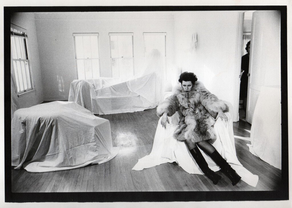 Photo by Moshe Brakha, taken in Tere's living room in Los Angeles, 1975. Tere's mother peers in through the door.
