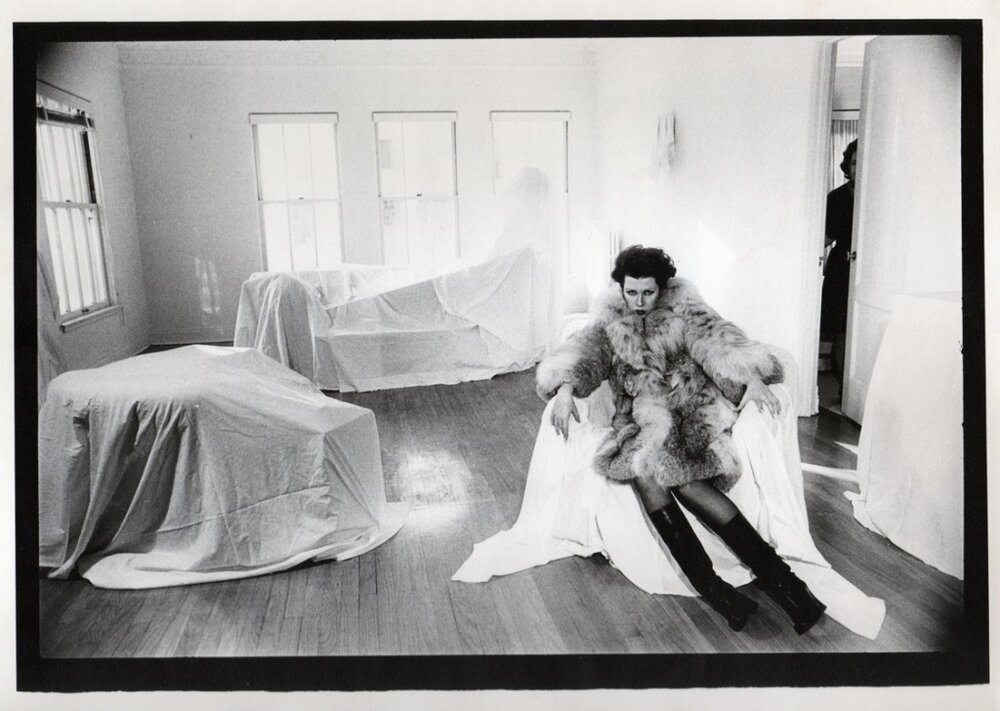 Photo by Moshe Brakha, taken in Tere's living room in Los Angeles, 1975. Tere's mother peers in through the door.