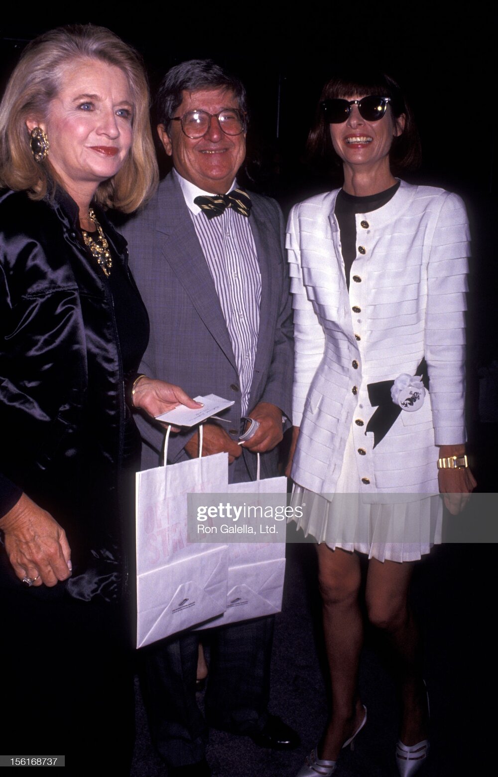 Shirley Lord, Abe Rosenthal and Anna Wintour attend Chanel Presents 'Off The Street' Fashion Show on September 12, 1991 at Bergdorf Goodman.