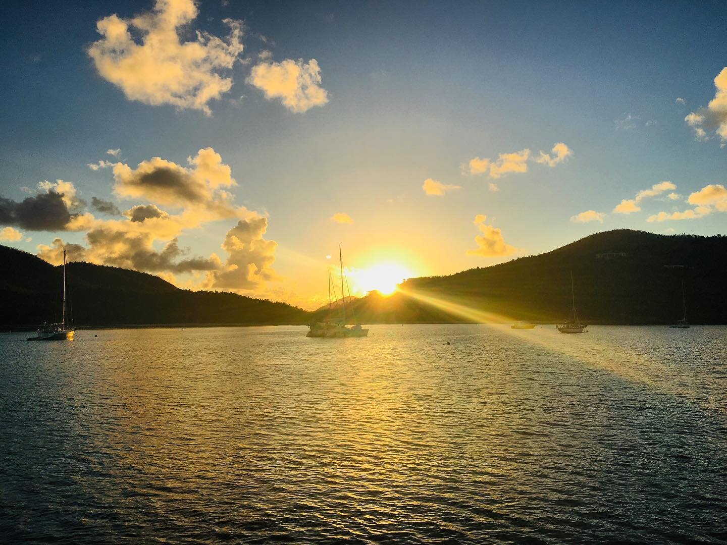 🌅 #traveltuesdays inspiration - Sunset in Francis Bay, St. John. This gorgeous Caribbean island is a US Territory and a great place to explore. Bob + I lived aboard our catamaran in the British and US Virgin Islands for more than six months so we&rs