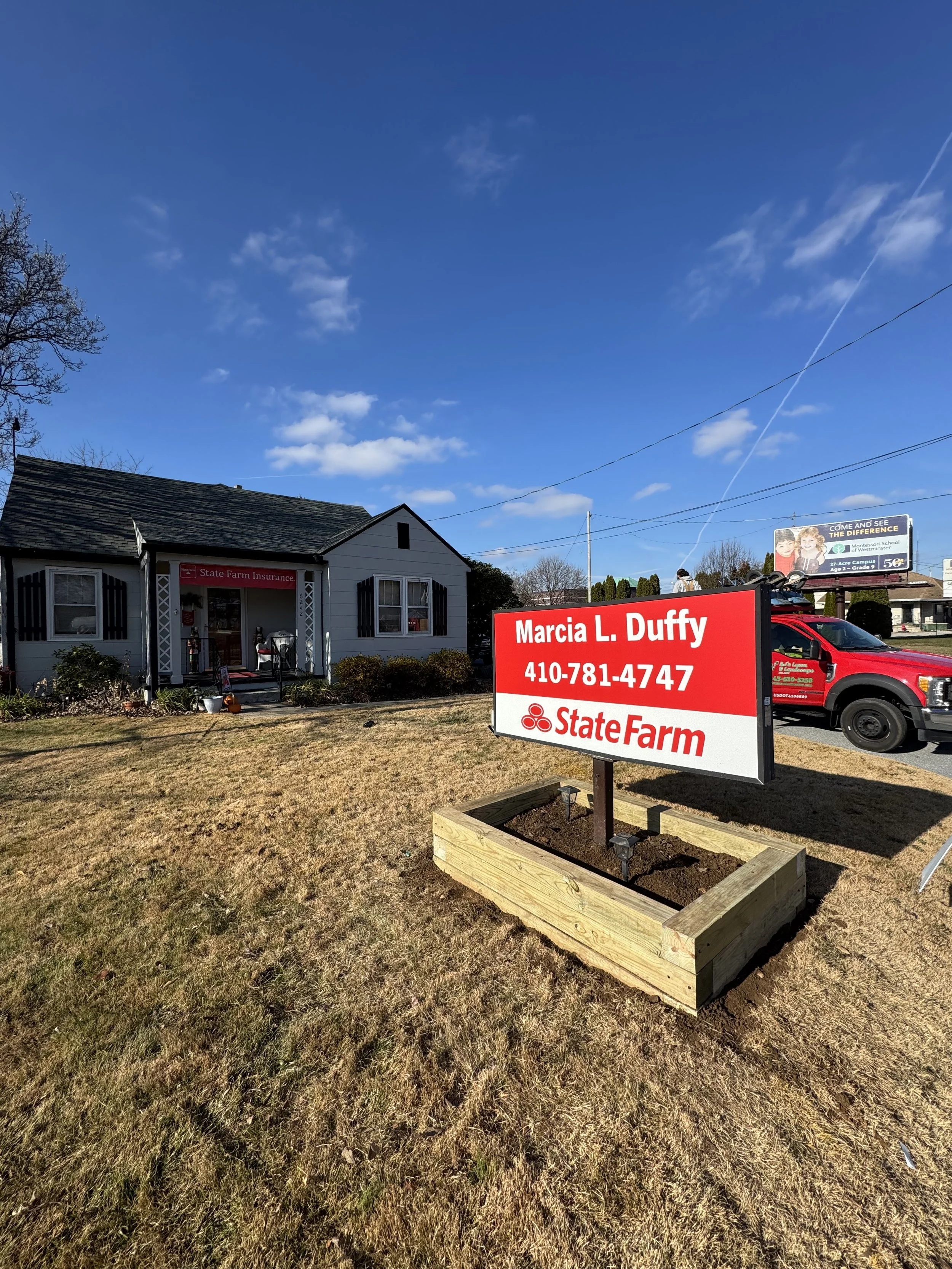 Custom Timber Sign Landscape Wall Installation for State Farm Office in Eldersburg, MD