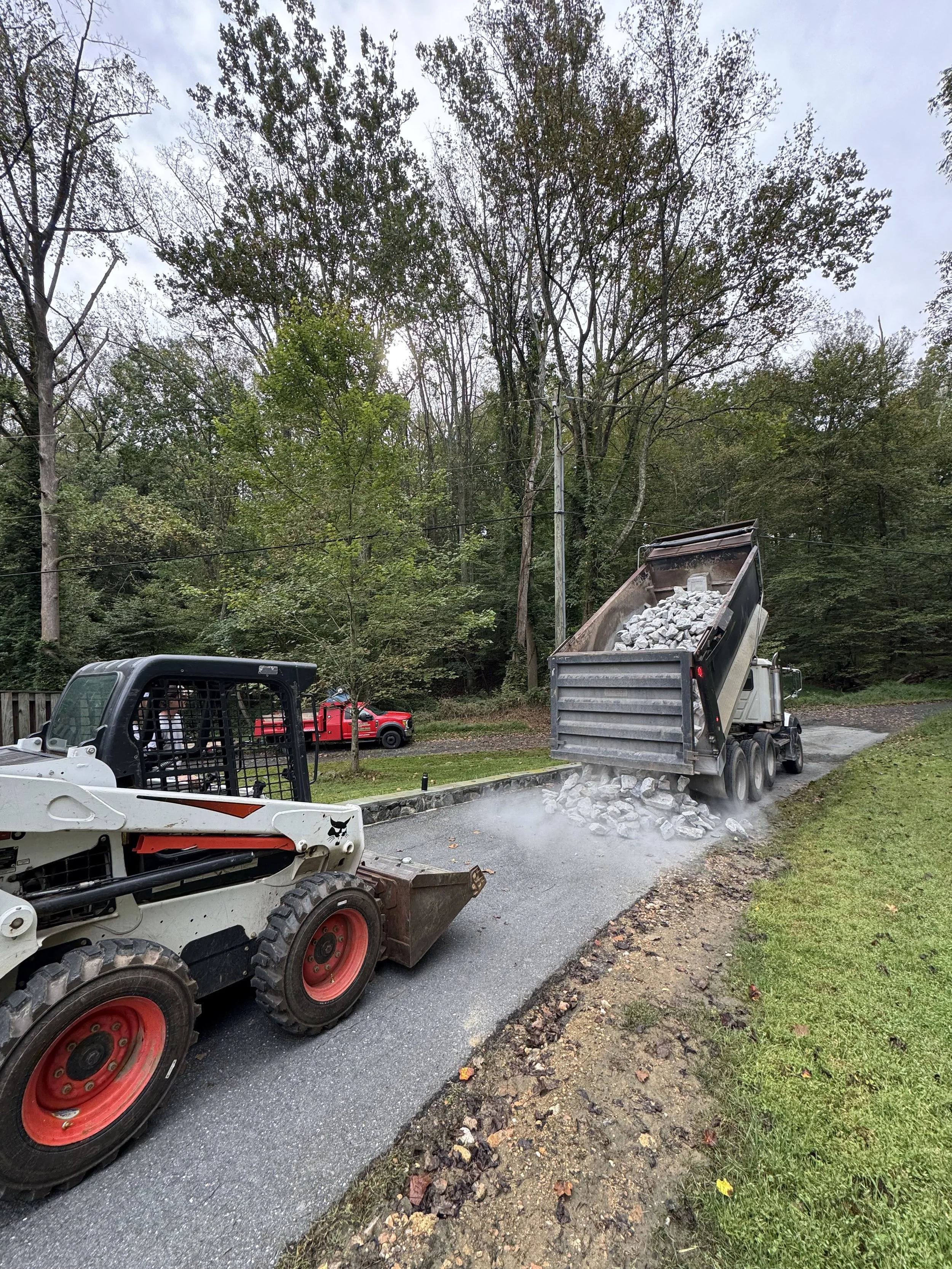 Large-Scale Rip Rap Installation Protects Driveway from Erosion in Ellicott City, MD