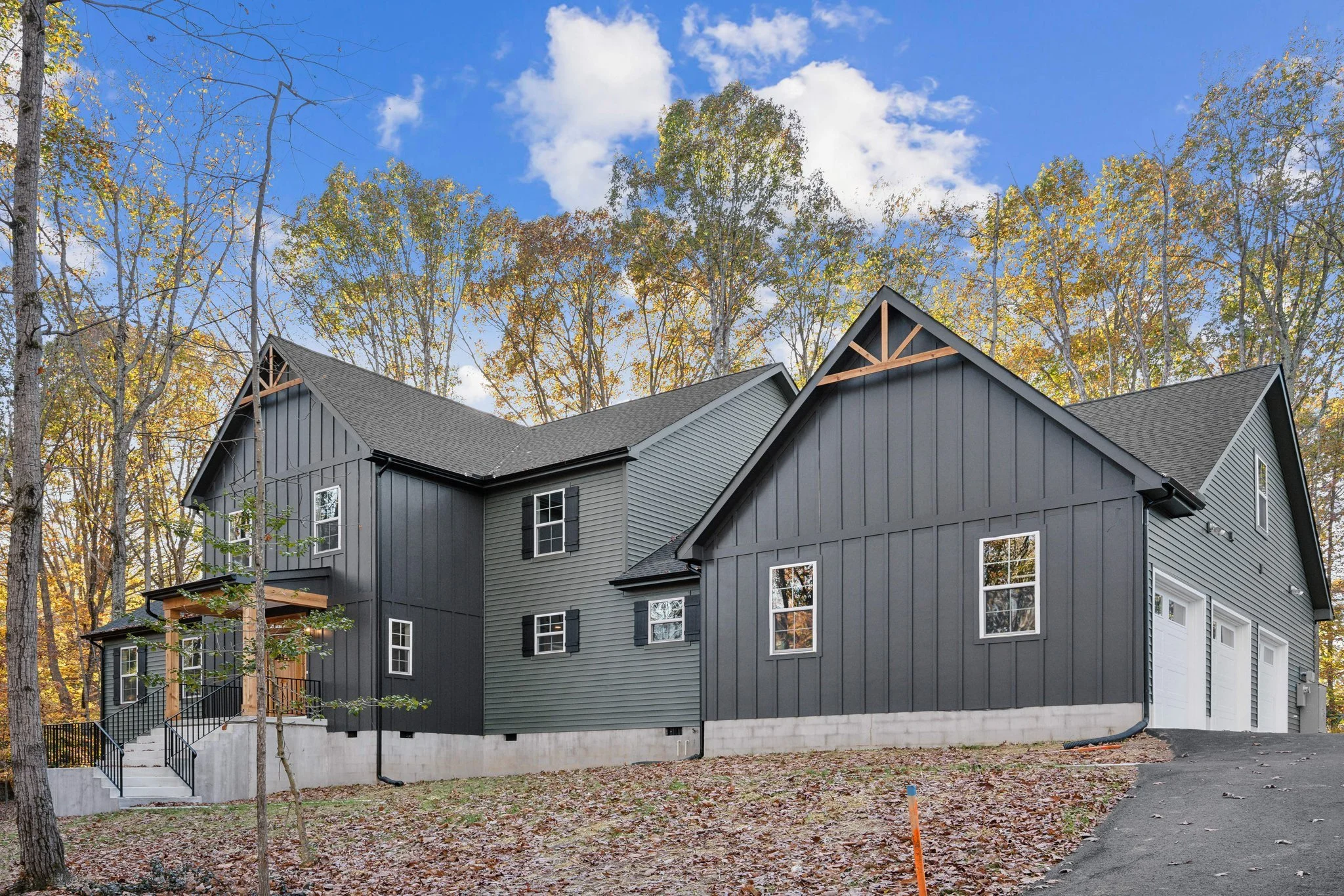 Backyard view of a Margate Drive black home design.
