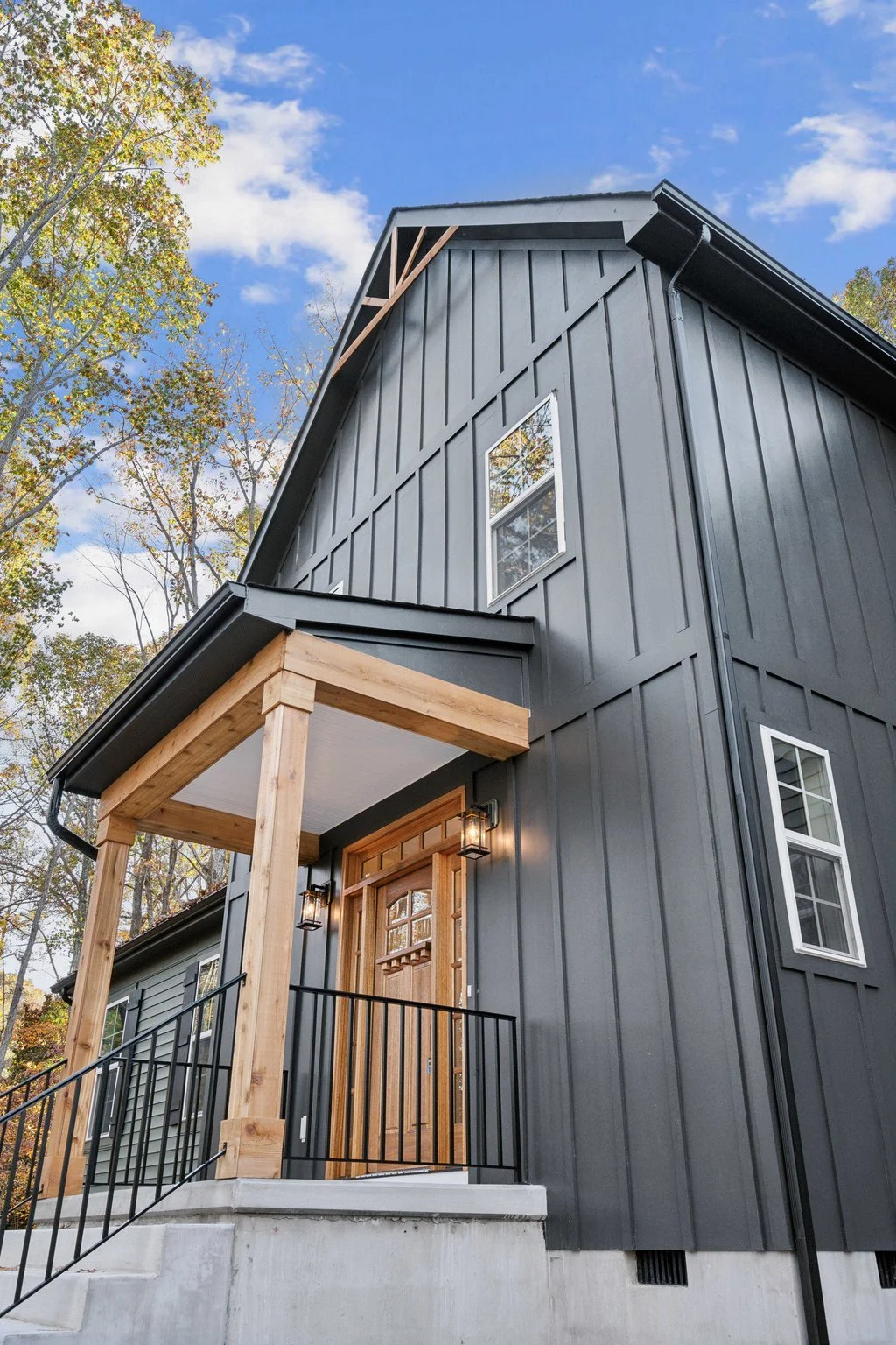 Close-up of a black farmhouse-style home entrance