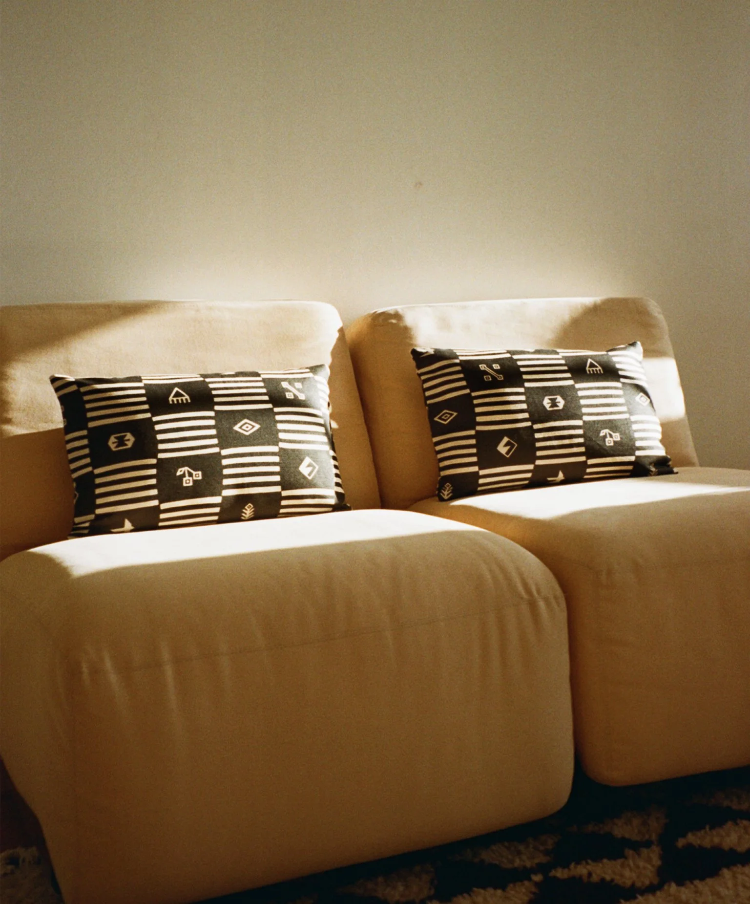 Cherry Flips Upholstery Checkmate in Ecru-Black cushions.jpg