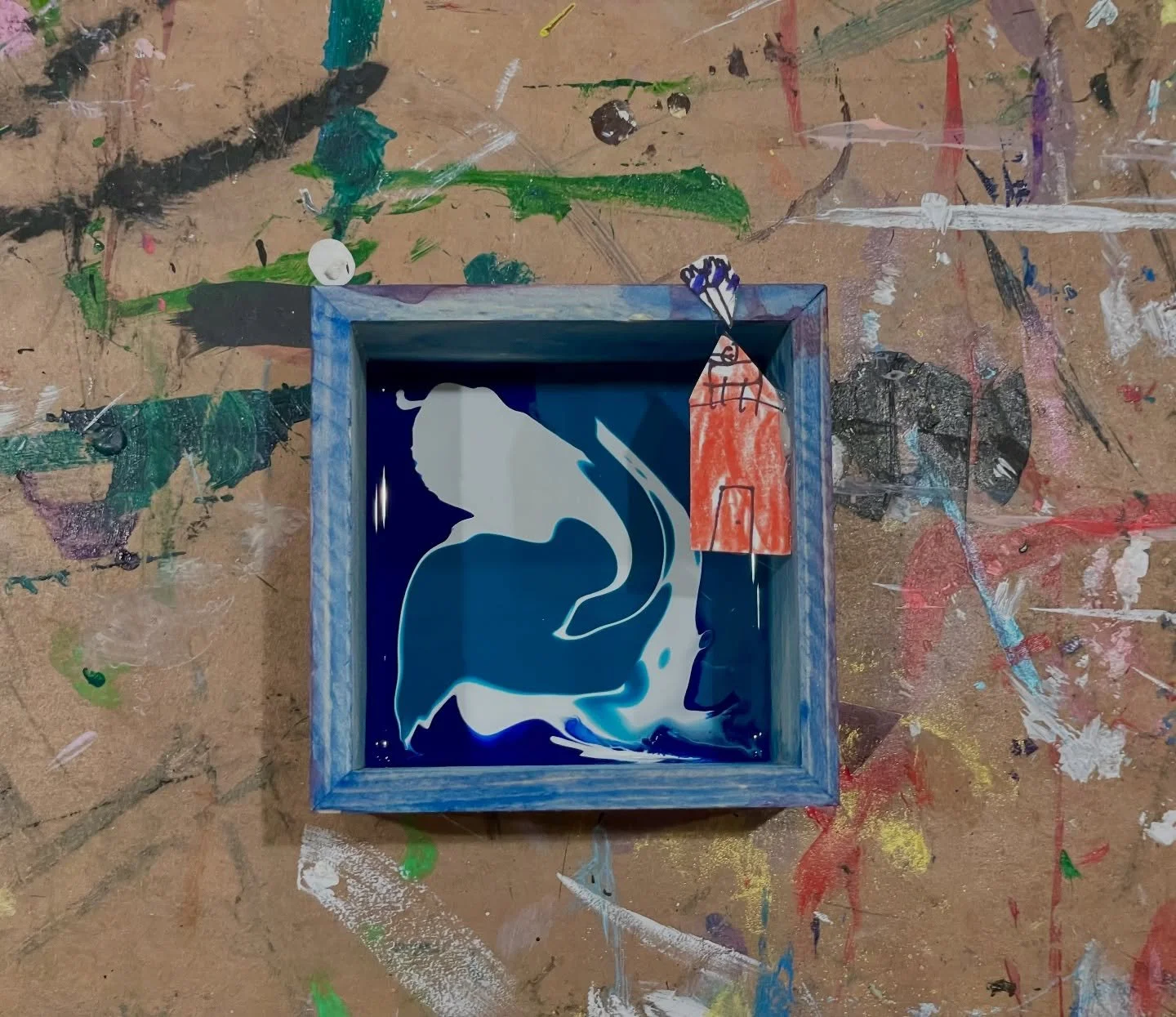 Today it rained, so our class turned toward houses and what it means to have a roof. We read an old poem about all the different kinds of homes: brick, mud, tiny, tall, and then each child drew and painted their own little house to place inside a box