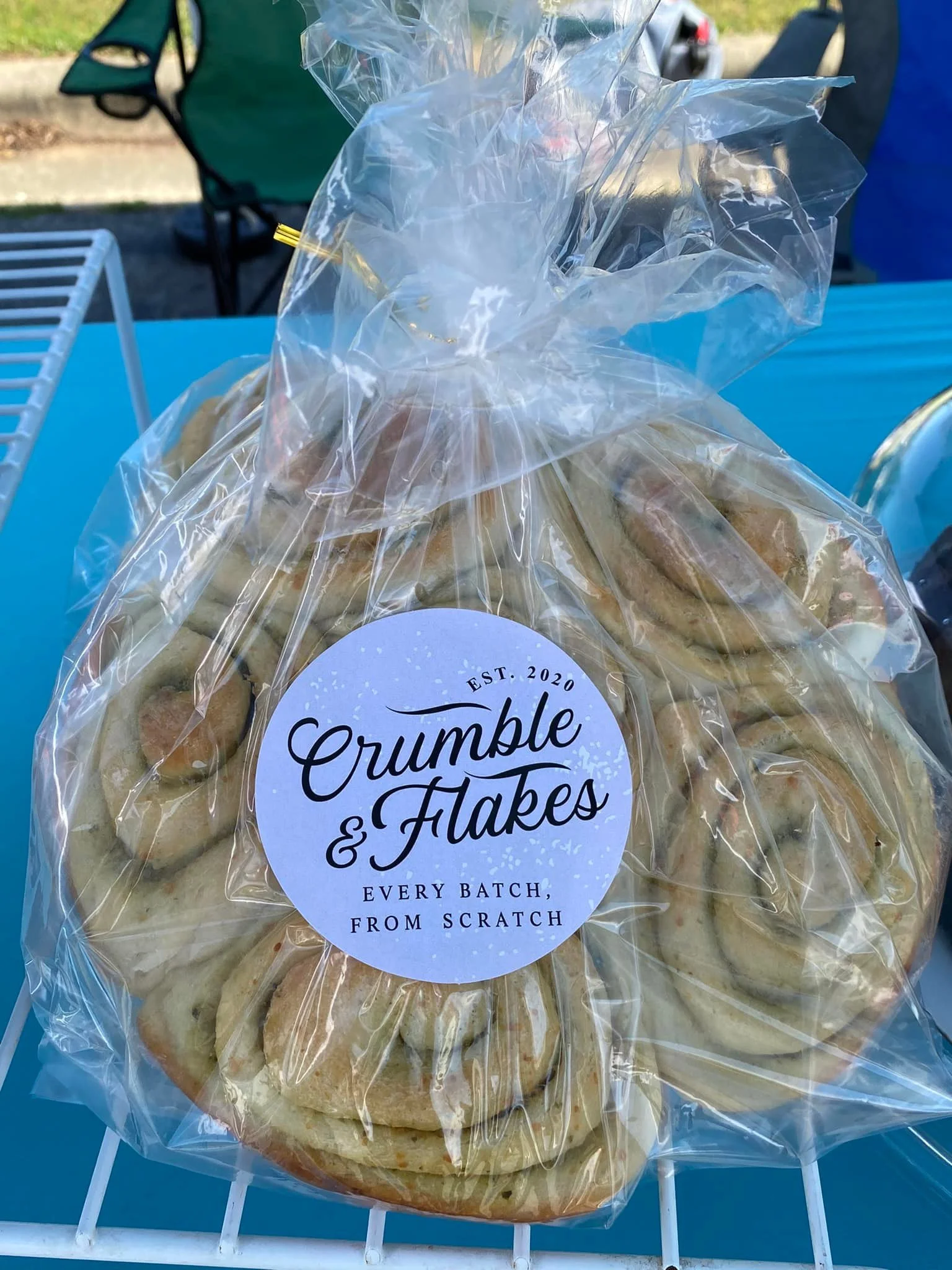 Packaged spiral bread from Crumble & Flakes Bakery.