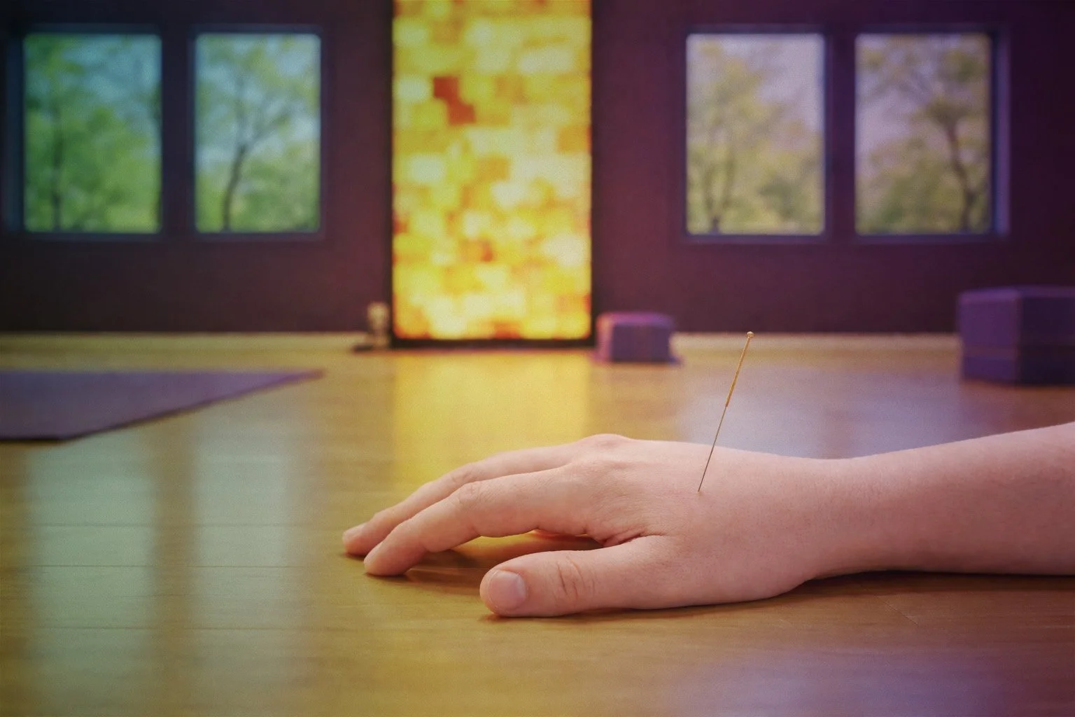 Acupuncture needle in hand during yoga session in Geneva IL