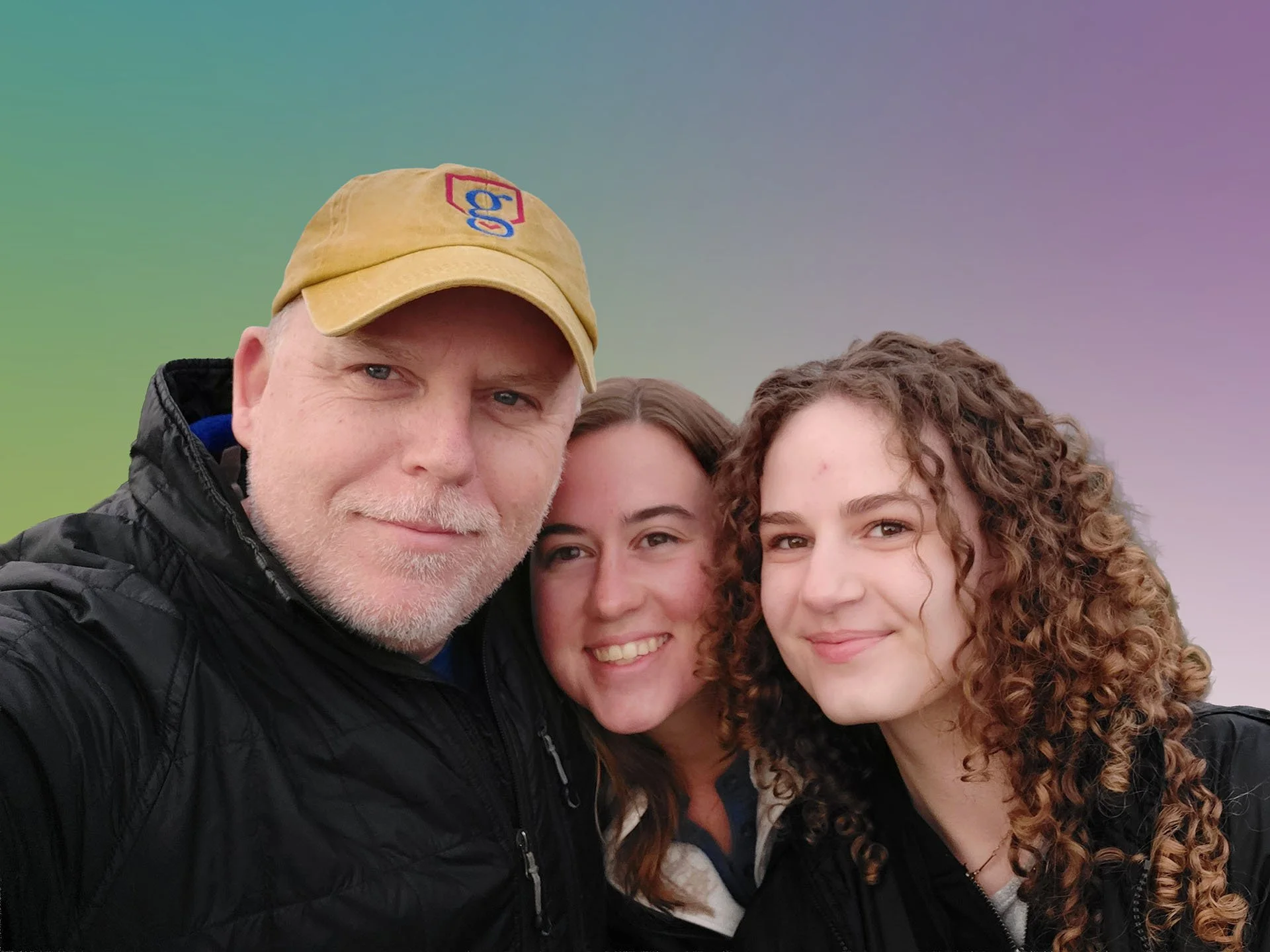Prana Yoga Center's member of the month, Dan Davis with his daughters