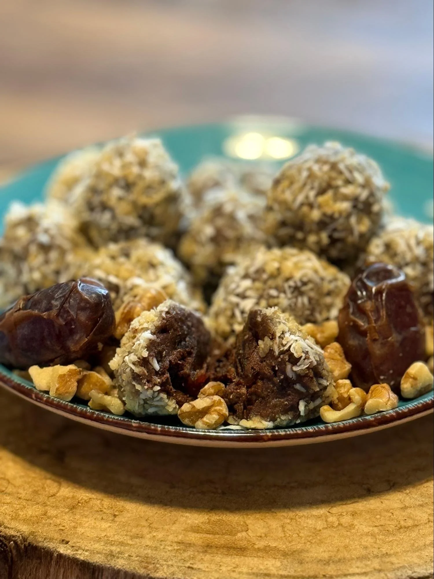 Chocolate brownie date balls made with walnuts, cocoa, and dates