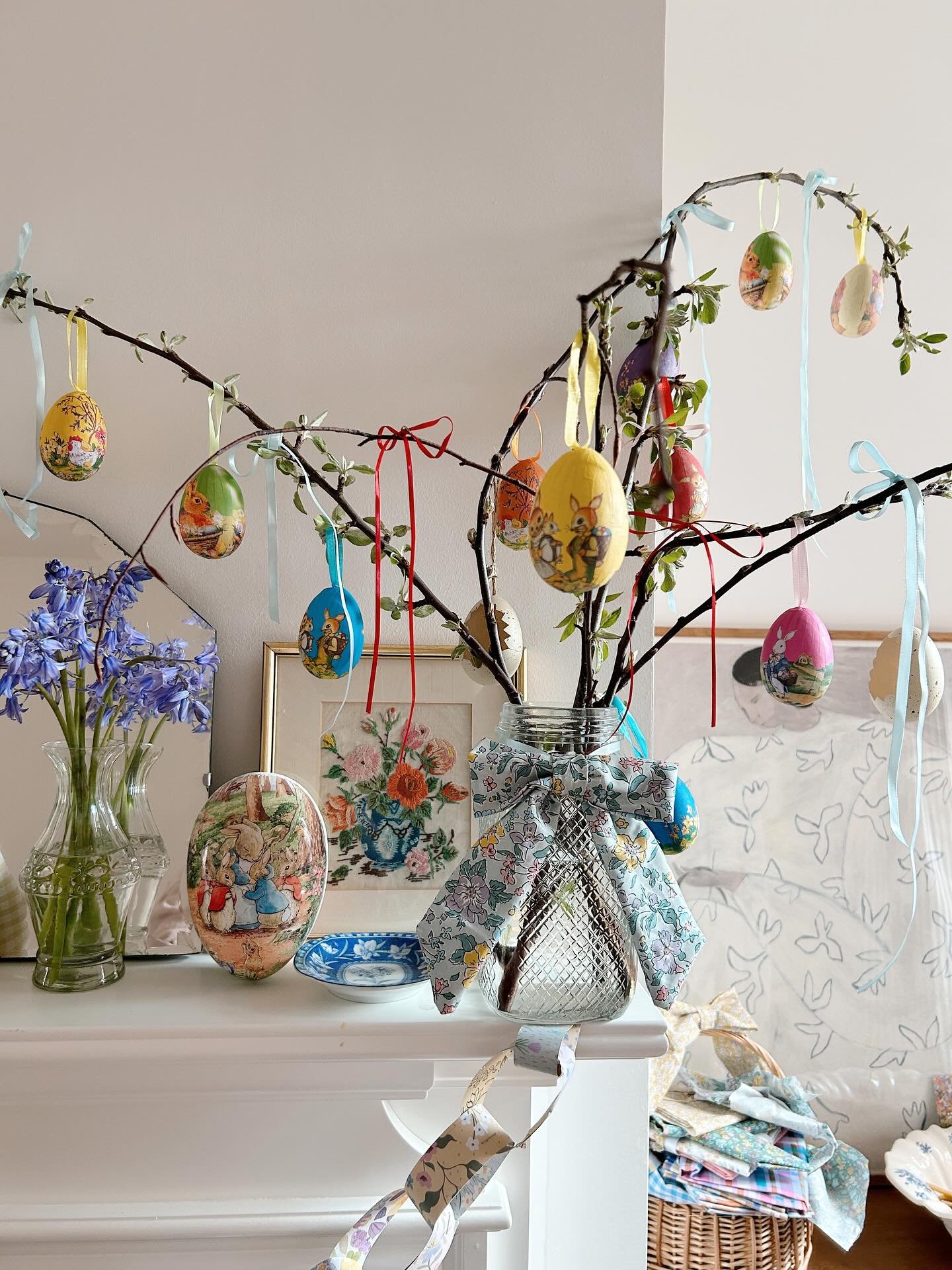 Added a touch of Easter magic to my mantelpiece this afternoon ready for the weekend ahead&hellip; a little Easter tree, big handmade gingham bow &amp; bluebells from the garden 🌼🐰