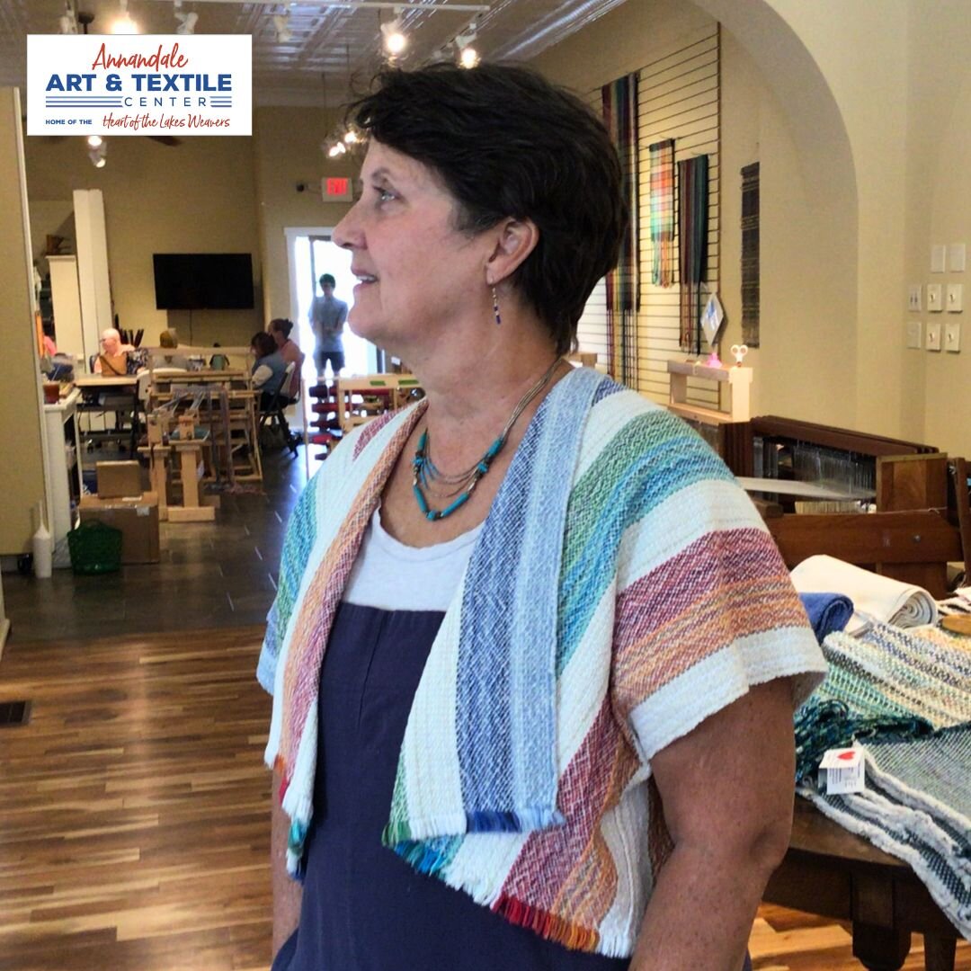 Looking for a great one-of-a-kind addition to your summer wardrobe? Diane, our weaving teacher and head of the Heart of the Lakes weaving program, is modeling one of our new pieces - a short shrug created from Heart of the Lakes woven textiles.

Visi