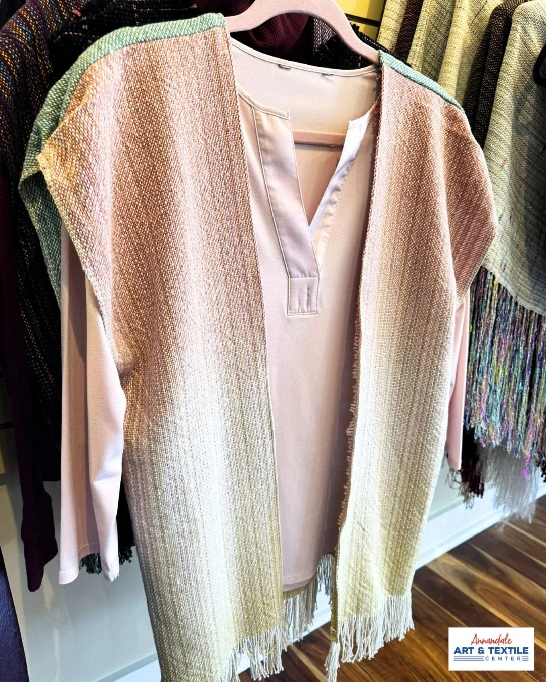 The perfect addition to your spring wardrobe - a woven vest! Crafted from textiles woven with joy and artistry by the Heart of the Lakes Weavers.

Plan a visit to AATC - at Annandale Art &amp; Textile Center artistry is celebrated each and every day!