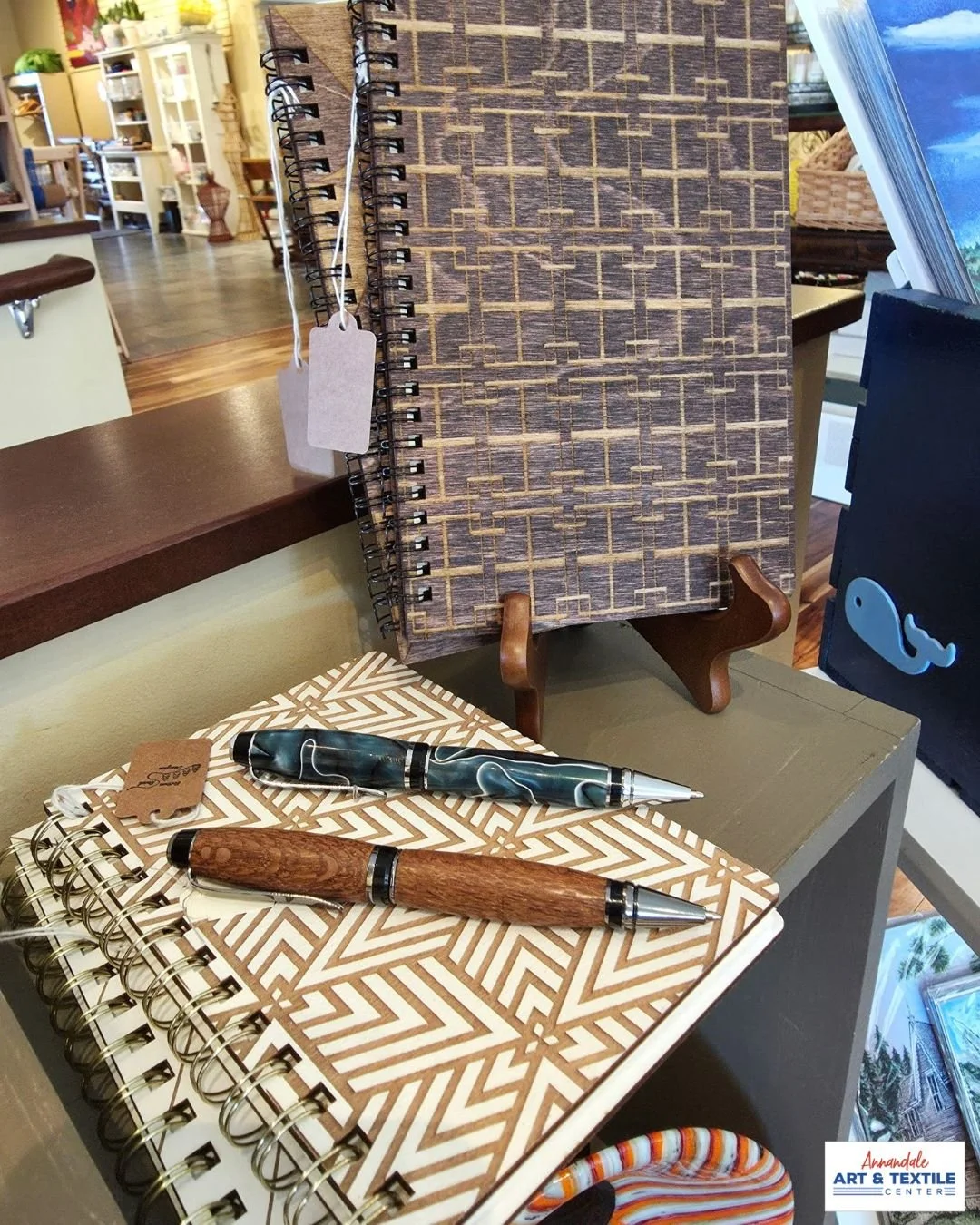 Gorgeous wood covered notebooks and turned pens! A great gift for a graduate or Dad.

Plan a visit to AATC - at Annandale Art &amp; Textile Center artistry is celebrated each and every day!

Our Spring hours are:
Tues-Fri 10A-4P
Sat 9A-1P
Closed Sund