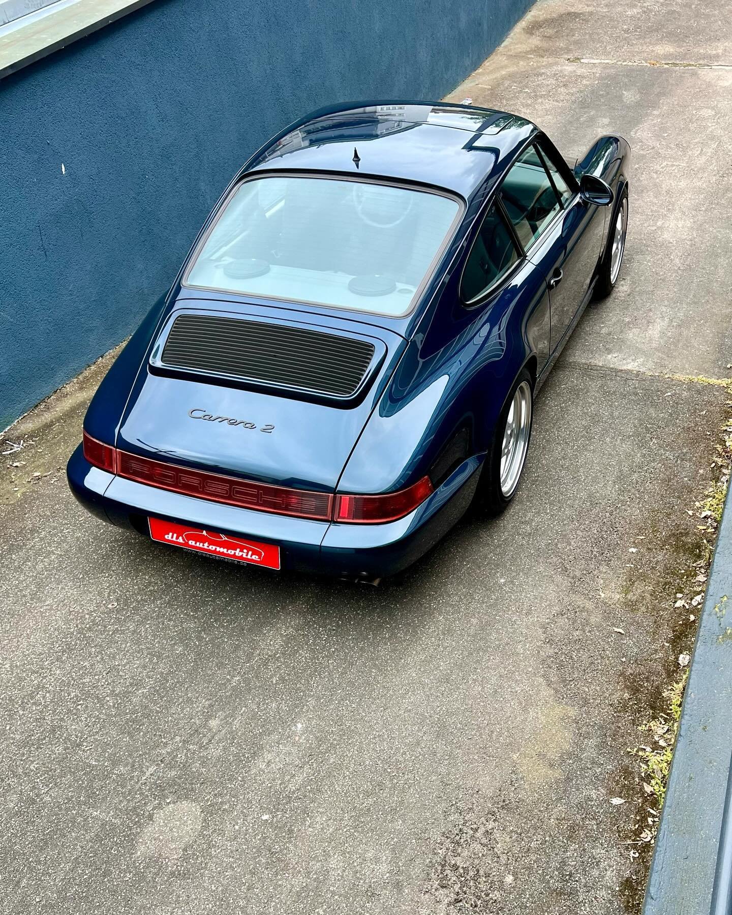 Some facts about our new arrival: Porsche 964 Carrera 2, first delivered in 1993 in Stuttgart, 105&lsquo; km mileage, &sbquo;Amazon green pearl&lsquo; (L39A) over grey leather interior, tiptronic gearbox, sunroof, no rear wiper, with the last owner f