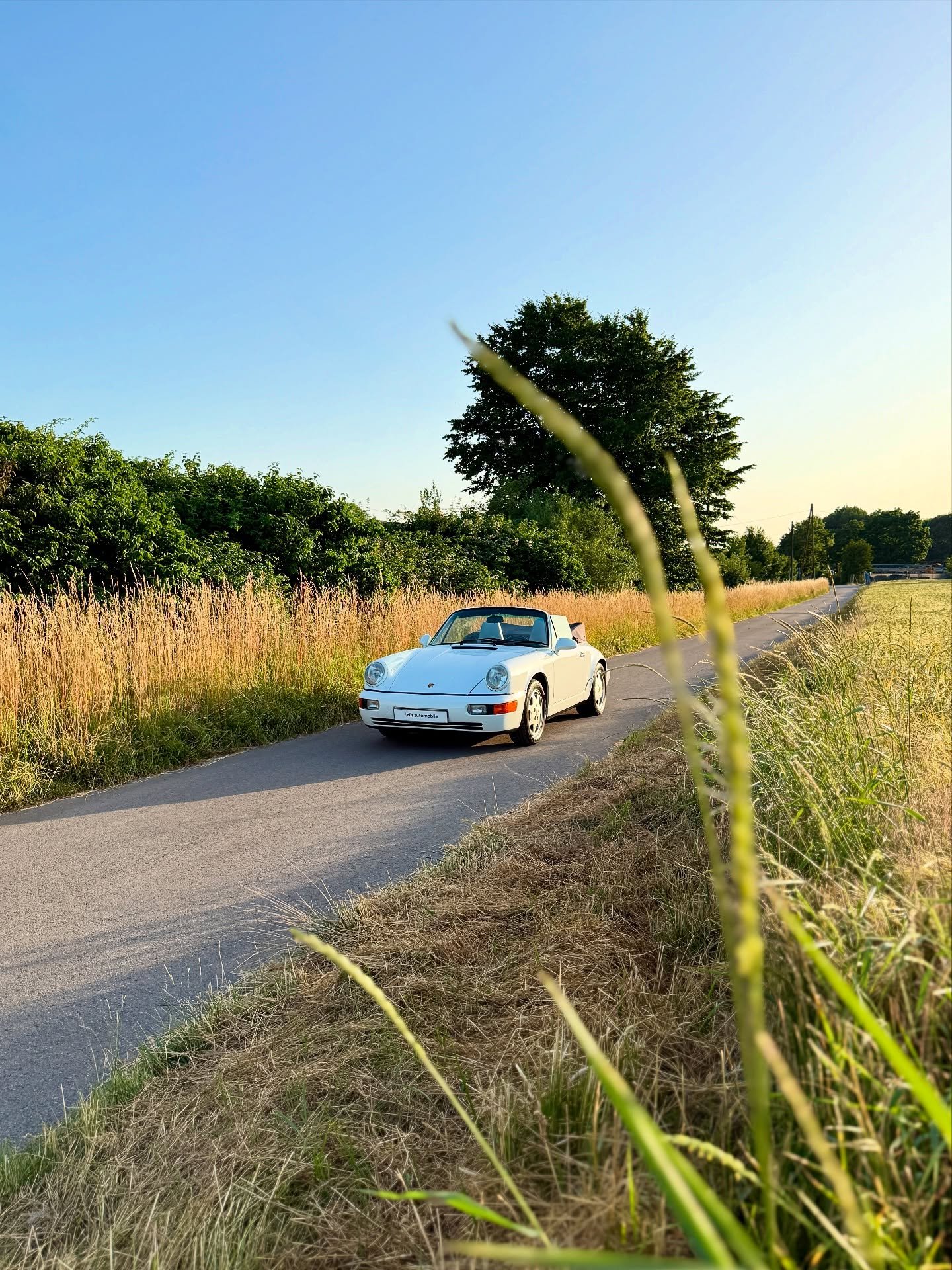 Just listed - yet long-time companion.

Porsche 964 Carrera 2 Cabrio: first registered in Houston/ Texas in 1993, imported by us in 2008 and part of our customer circle ever since. Grandprix-white/ Linen inside, 25.500 miles, manual, remarkably origi