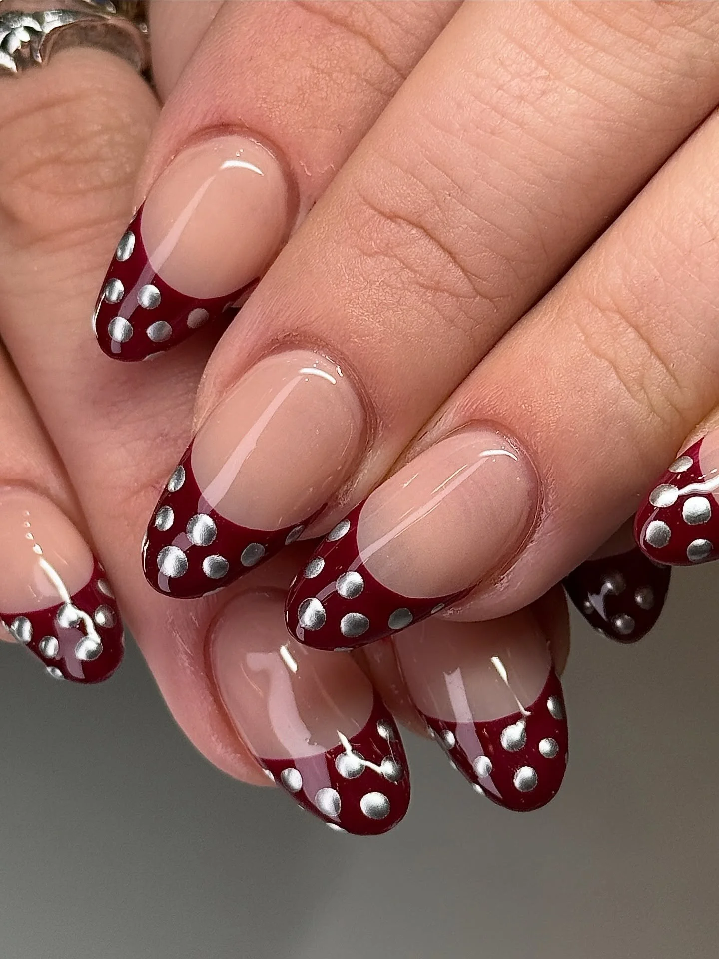 Burgundy French has been a favorite this Fall 🍂 ⁠by @nails.by.simon 
.⁠
Structured Gel &bull; Level 3⁠
📍Orchard Street, LES New York City ⁠
⁠
nyc nail tech, nail art, polka dot nails⁠
⁠