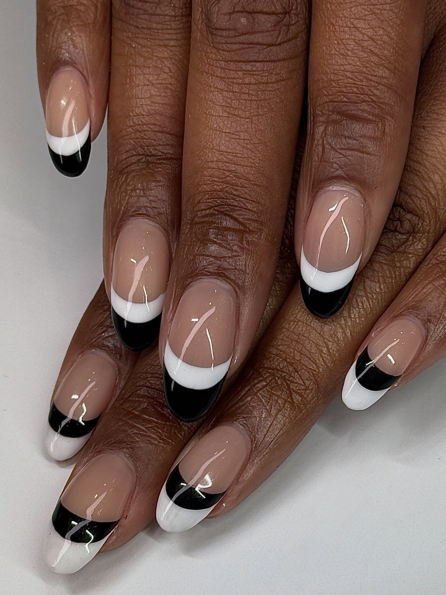 Black and white inverted French by Jenna @jennyiounails ⚫️⚪️⁠
.⁠
Strucutured Gel &bull; Level 2⁠
