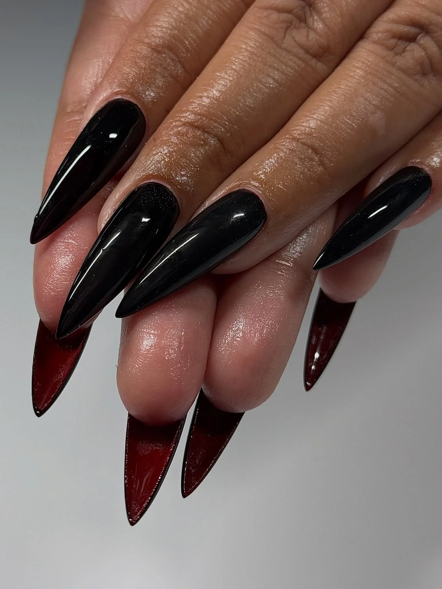 Peek-a-boo red bottoms by Jenna @jennyiounails 
.⁠
Gel-X &bull; Level 2
📍179 Orchard Street, Lower East Side NYC⁠
⁠
ID: Black stiletto shaped extensions with red underneath the nail by New York based nail tech specializing in nail art