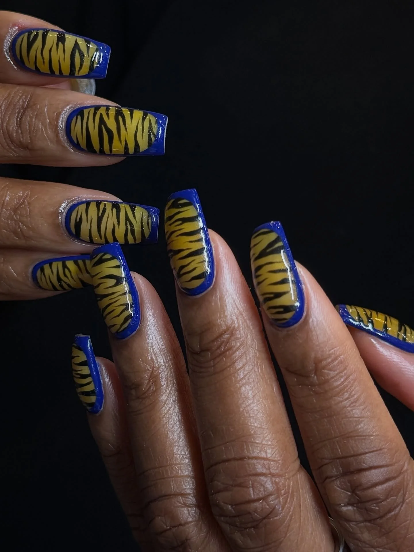 Tiger stripes on natural nails, hand painted by Serena @serenadidem⁠ 🐯 
.⁠
Structured Gel &bull; Level 3⁠
📍179 Orchard Street, Lower East Side NYC