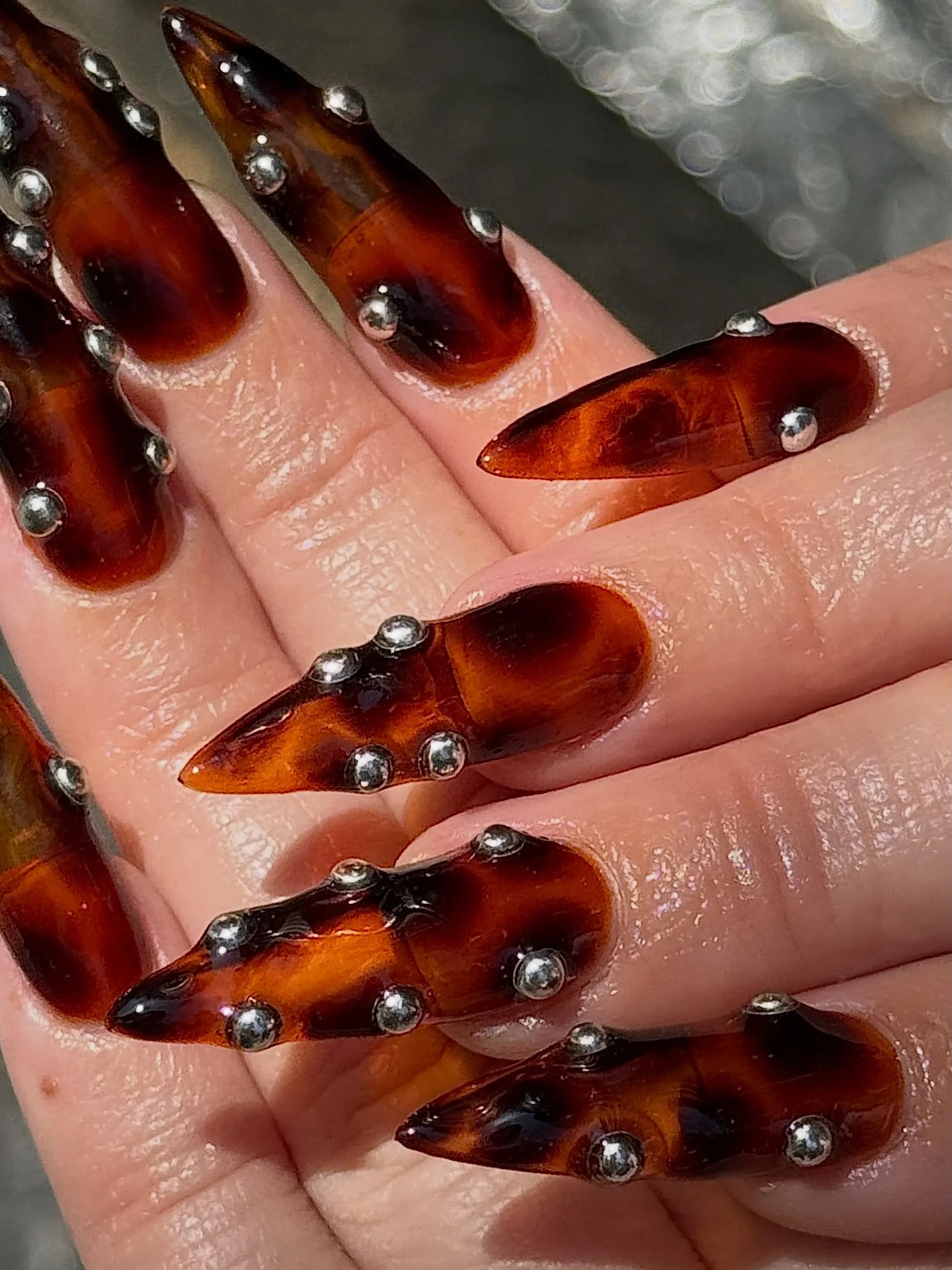Come to think of it...tortoise kind of eats with any combo 🤔 Pierced stilettos by Tallulah @tallulahjetnails 
.⁠
Gel-X &bull; Level 3⁠
📍Lower East Side NYC