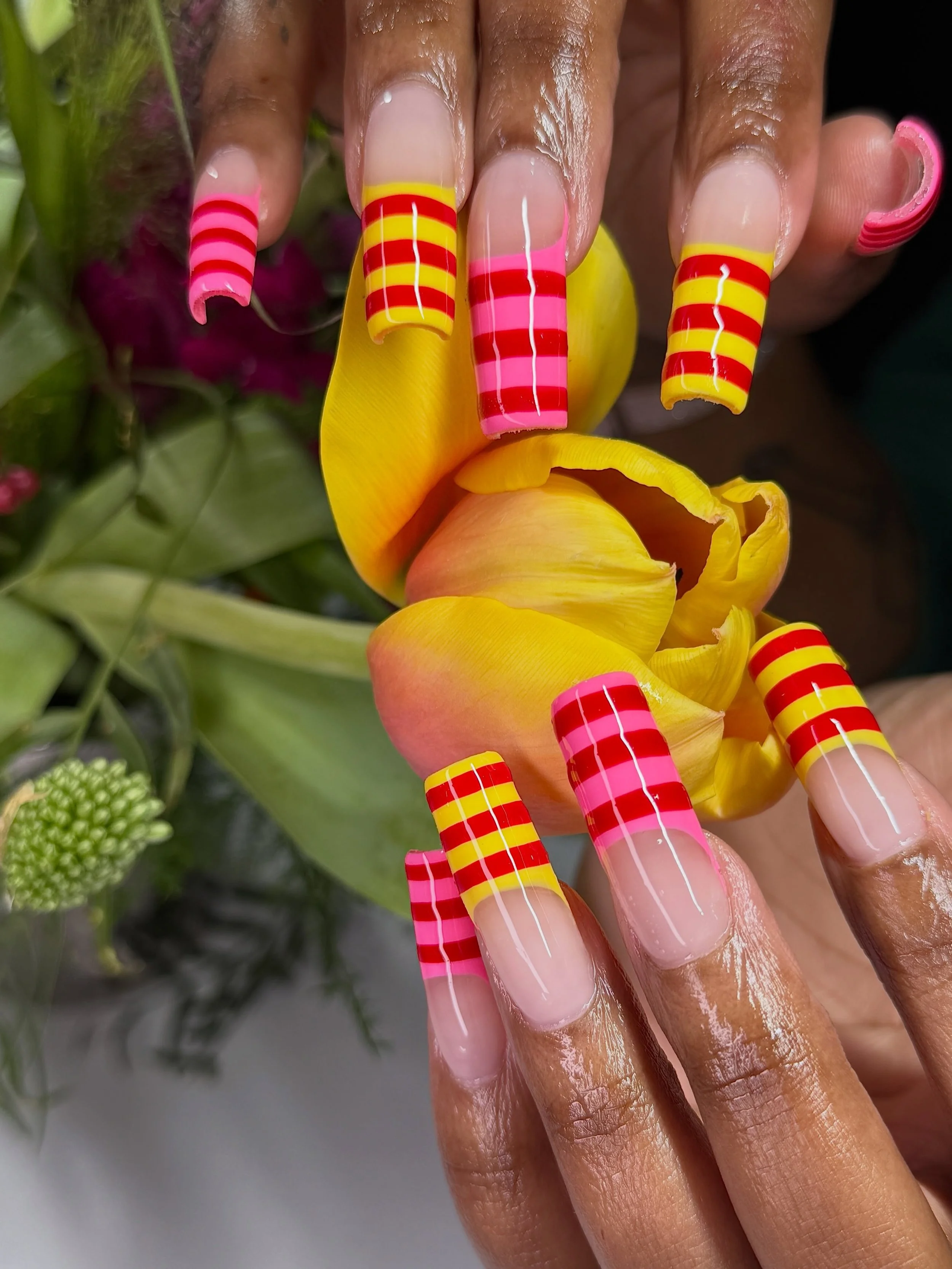 This set + a @joyflowerpotnyc arrangement are just what the doctor ordered 💐 Spring-coded striped French by Alize @nailafied⁠
.⁠
Gel-X &bull; Level 3⁠
📍LES, New York City