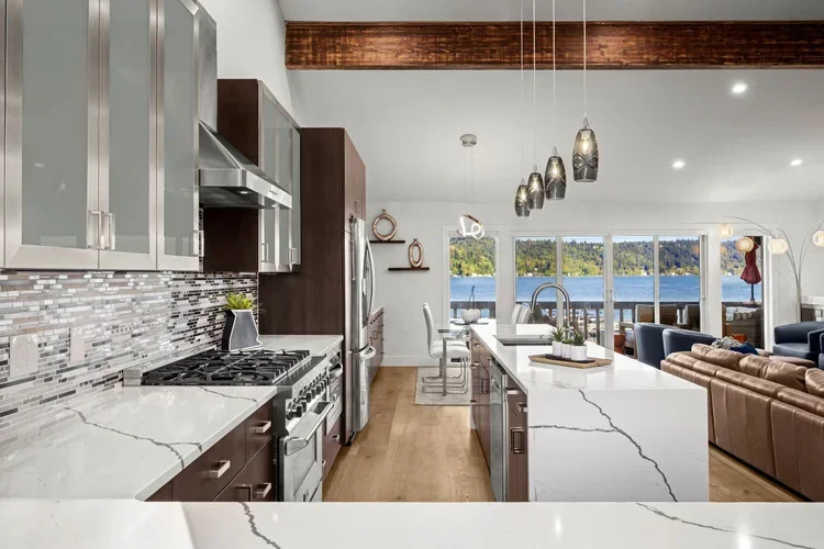 Open kitchen flowing into the living room with lake view